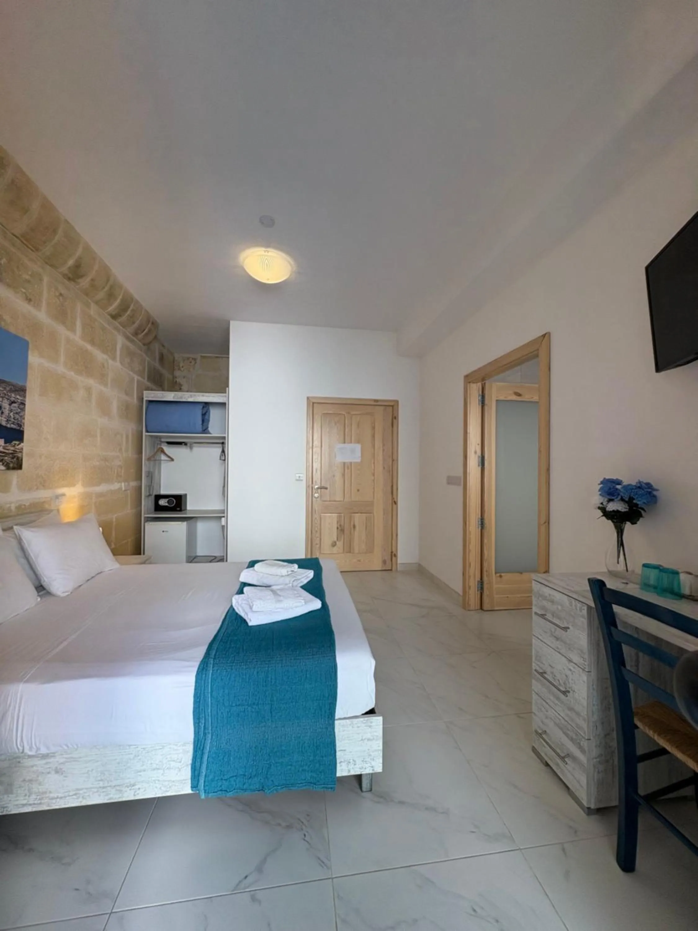 Bedroom in Fiftyfour West Boutique Living