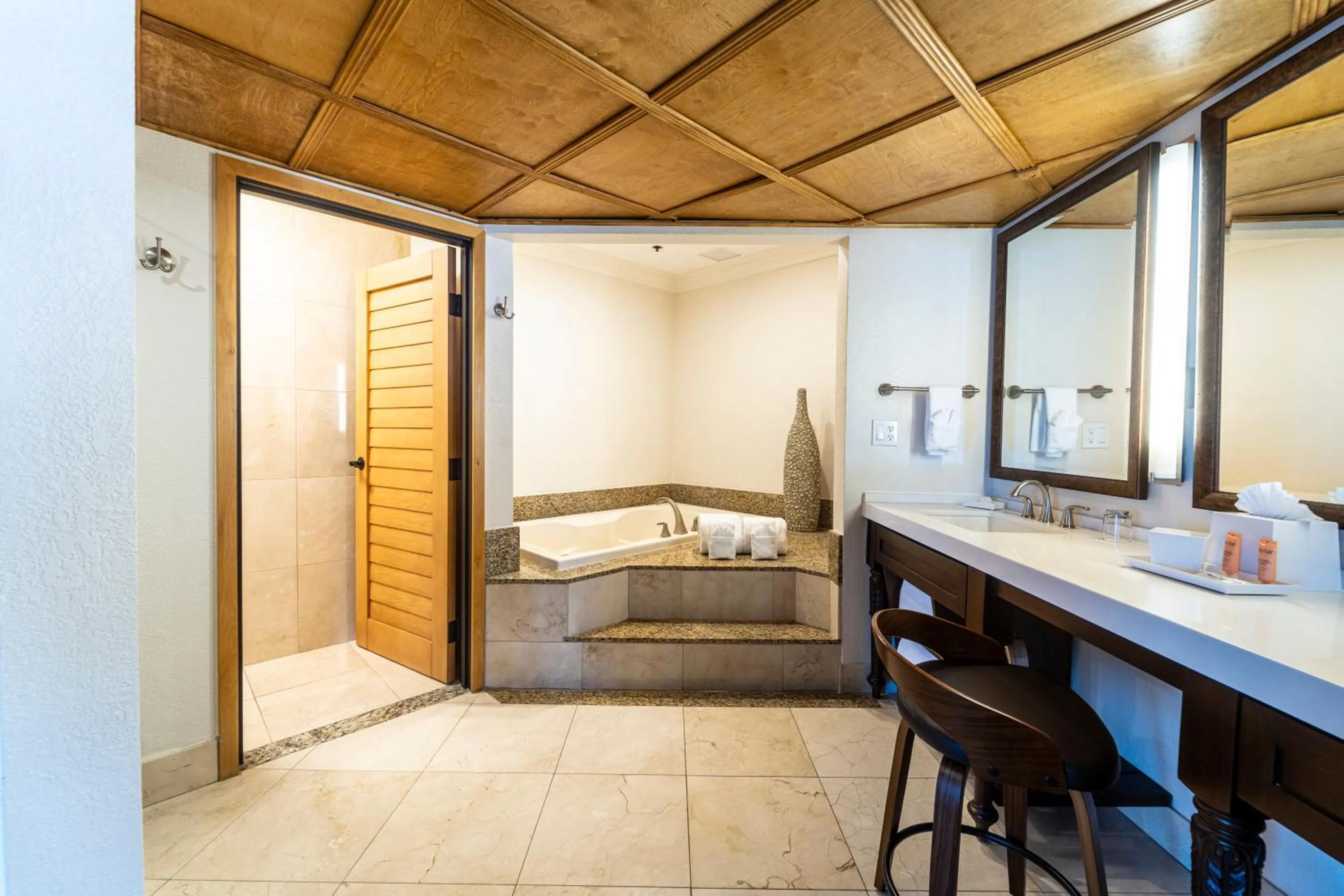 Bed in Pacific Terrace Hotel