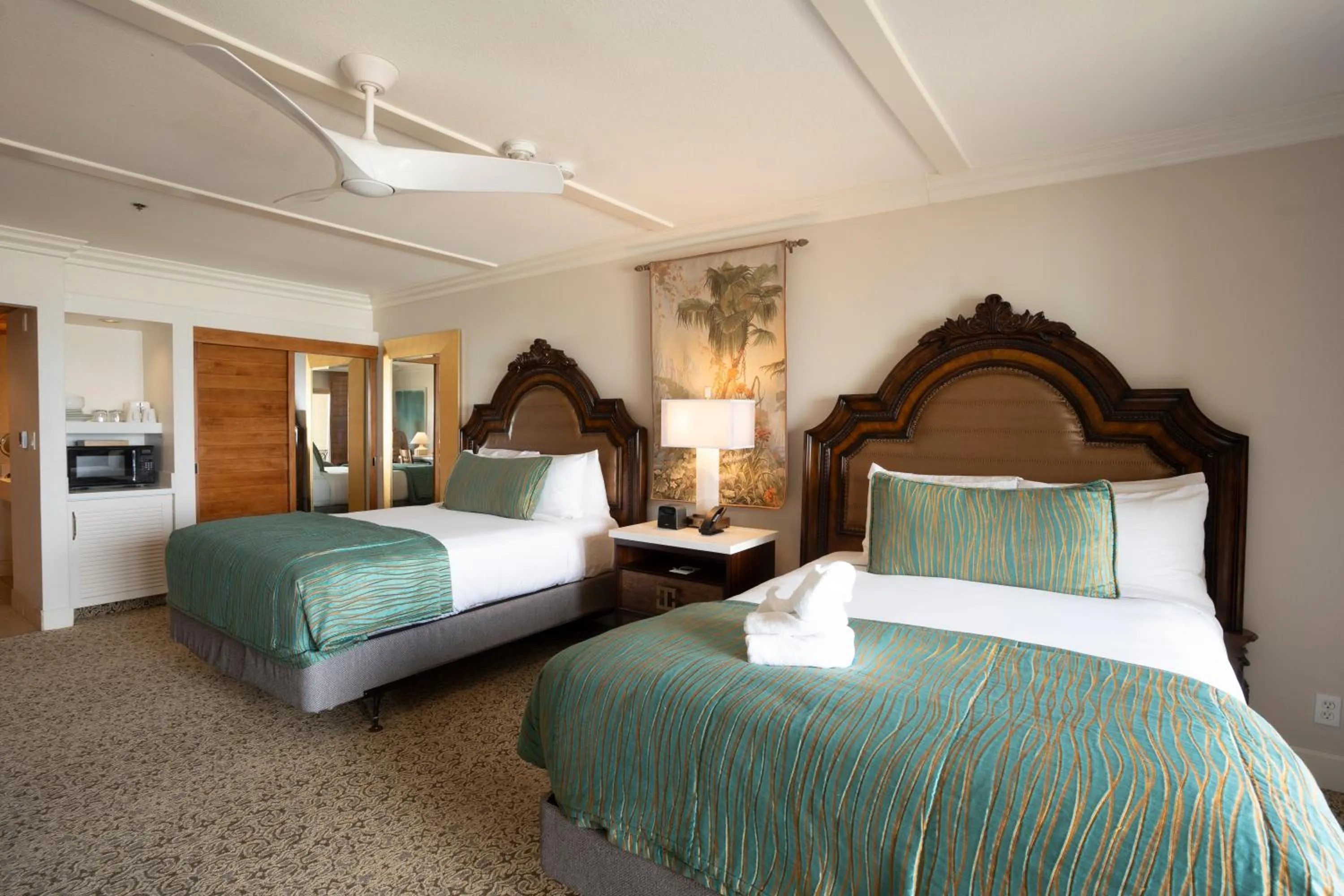 Bed in Pacific Terrace Hotel