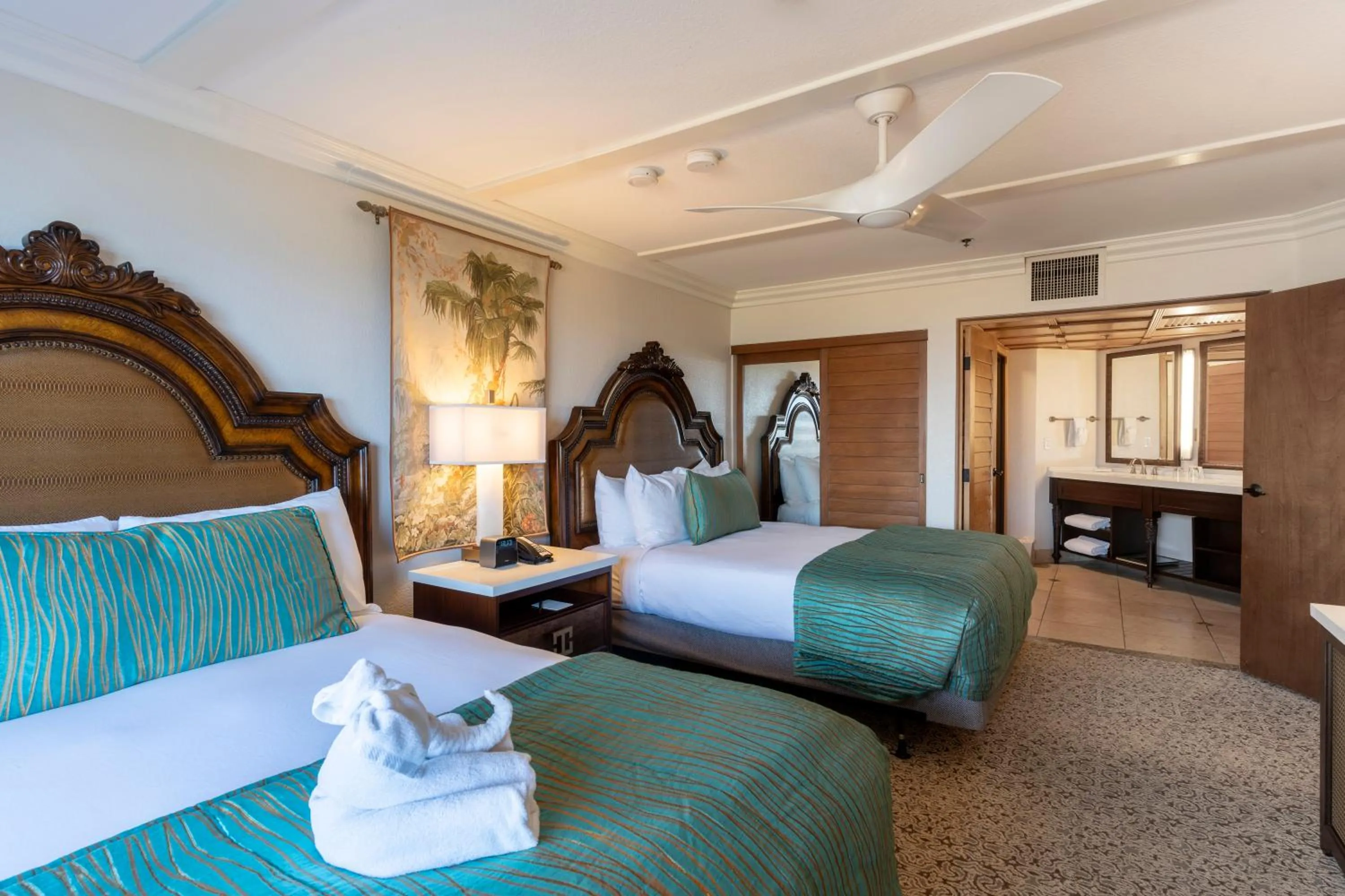 Bed in Pacific Terrace Hotel