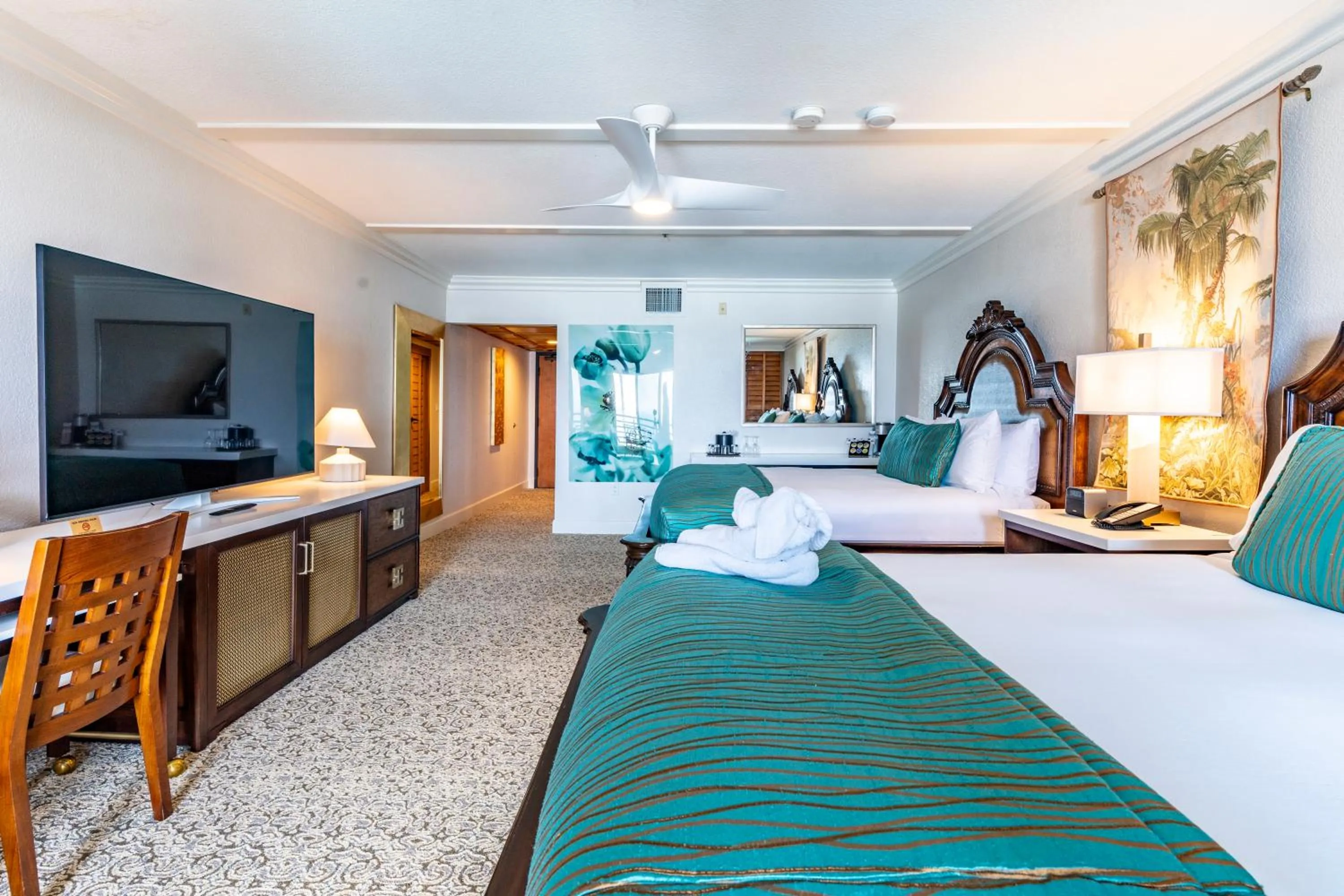 Bed in Pacific Terrace Hotel