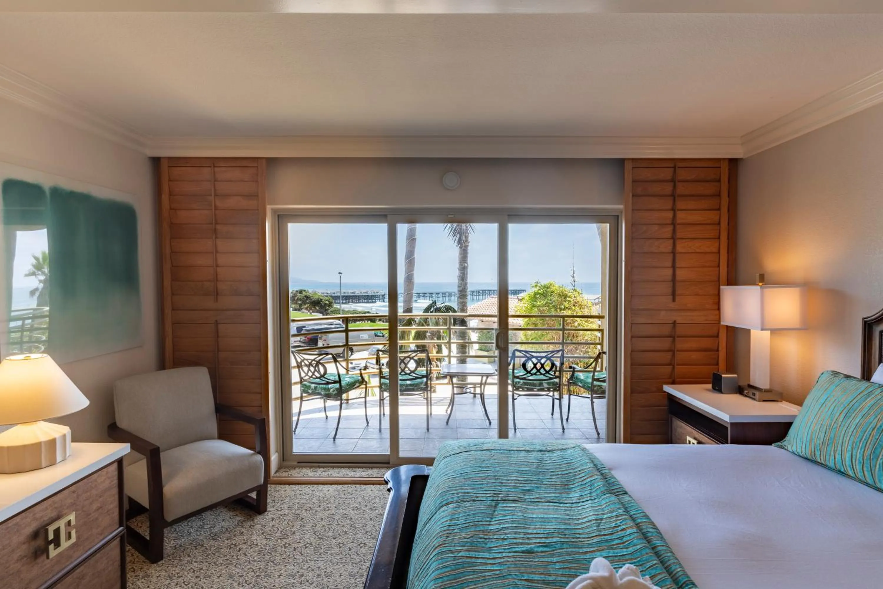 Bed in Pacific Terrace Hotel