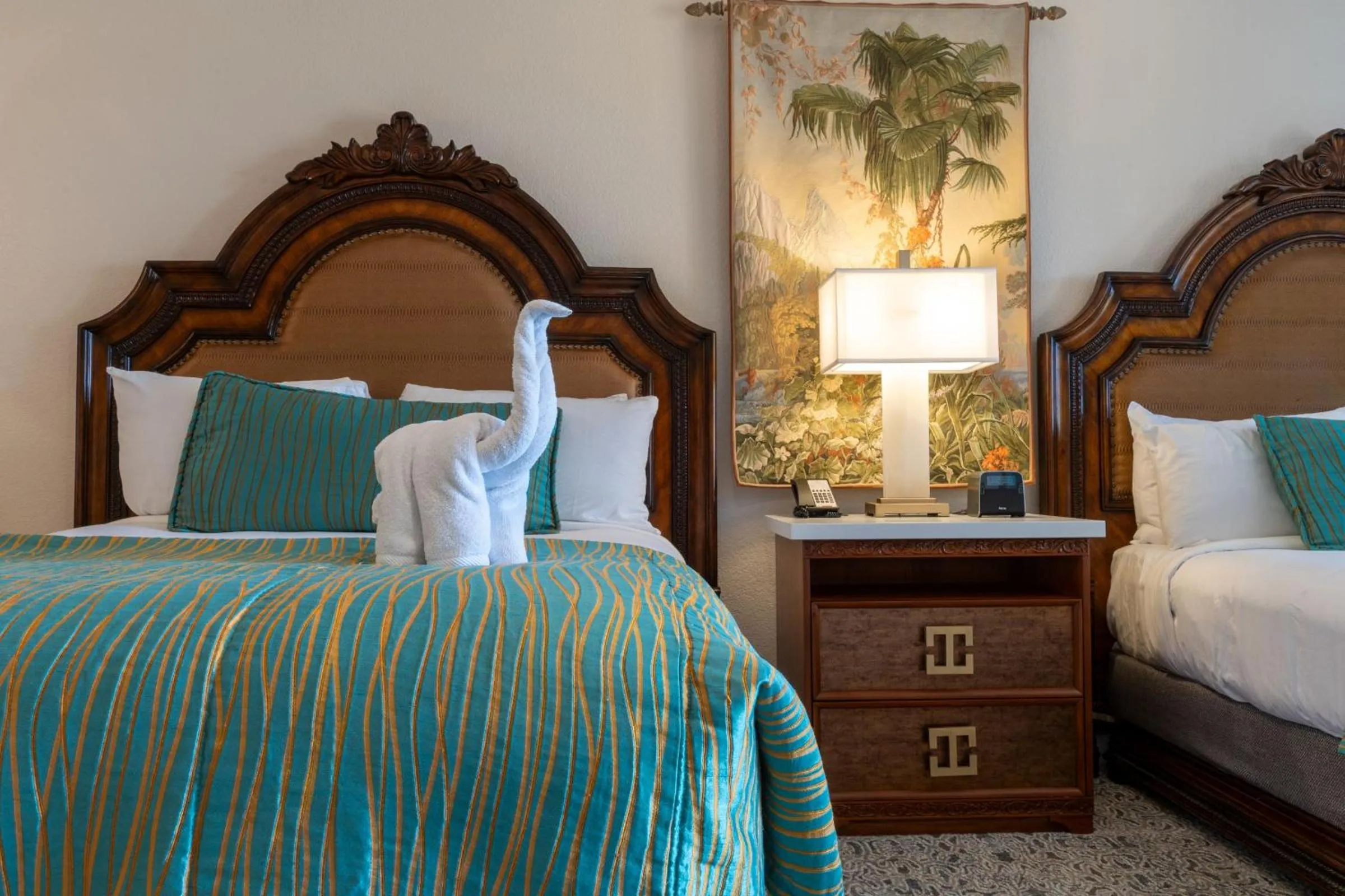 Bed in Pacific Terrace Hotel