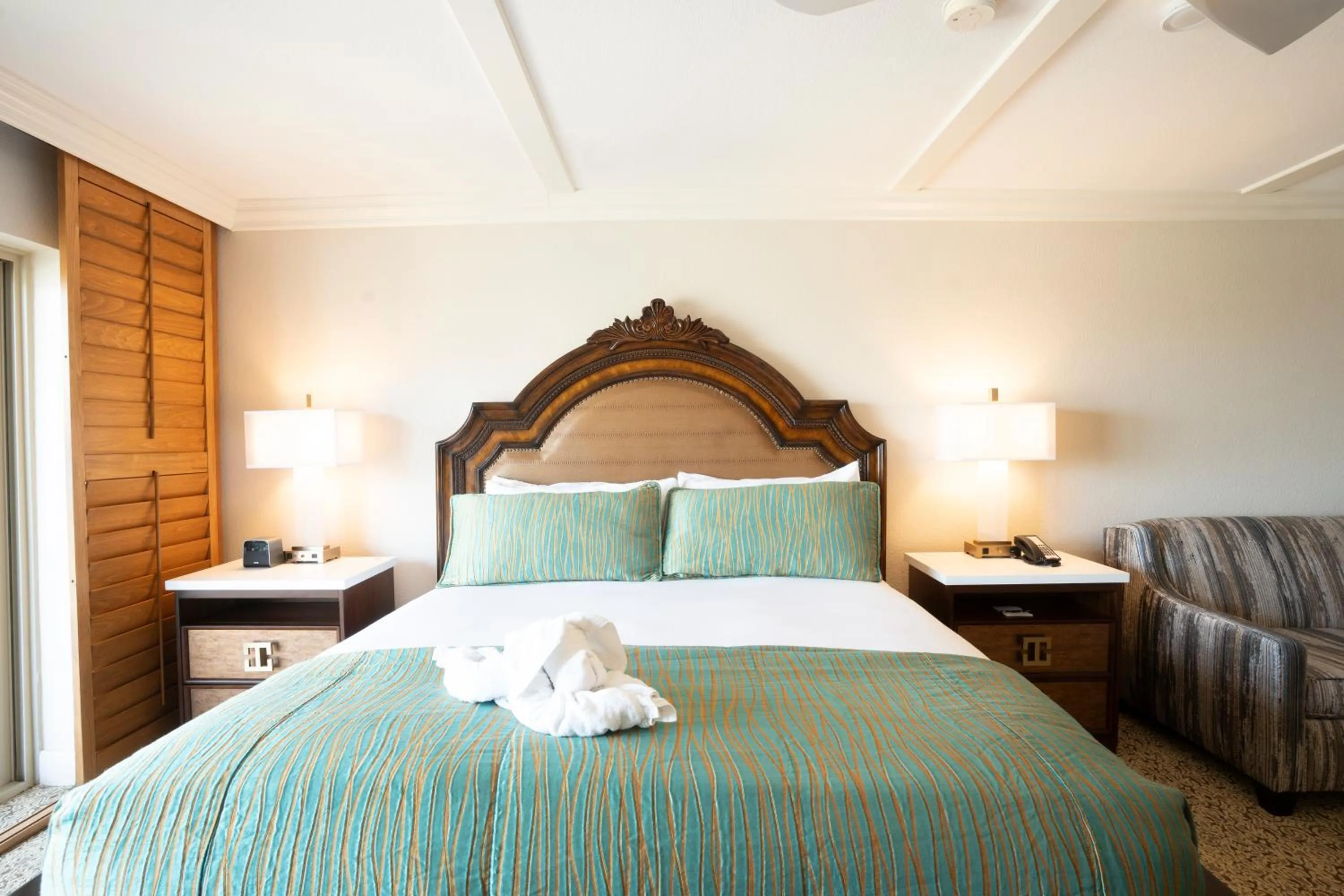 Bed in Pacific Terrace Hotel