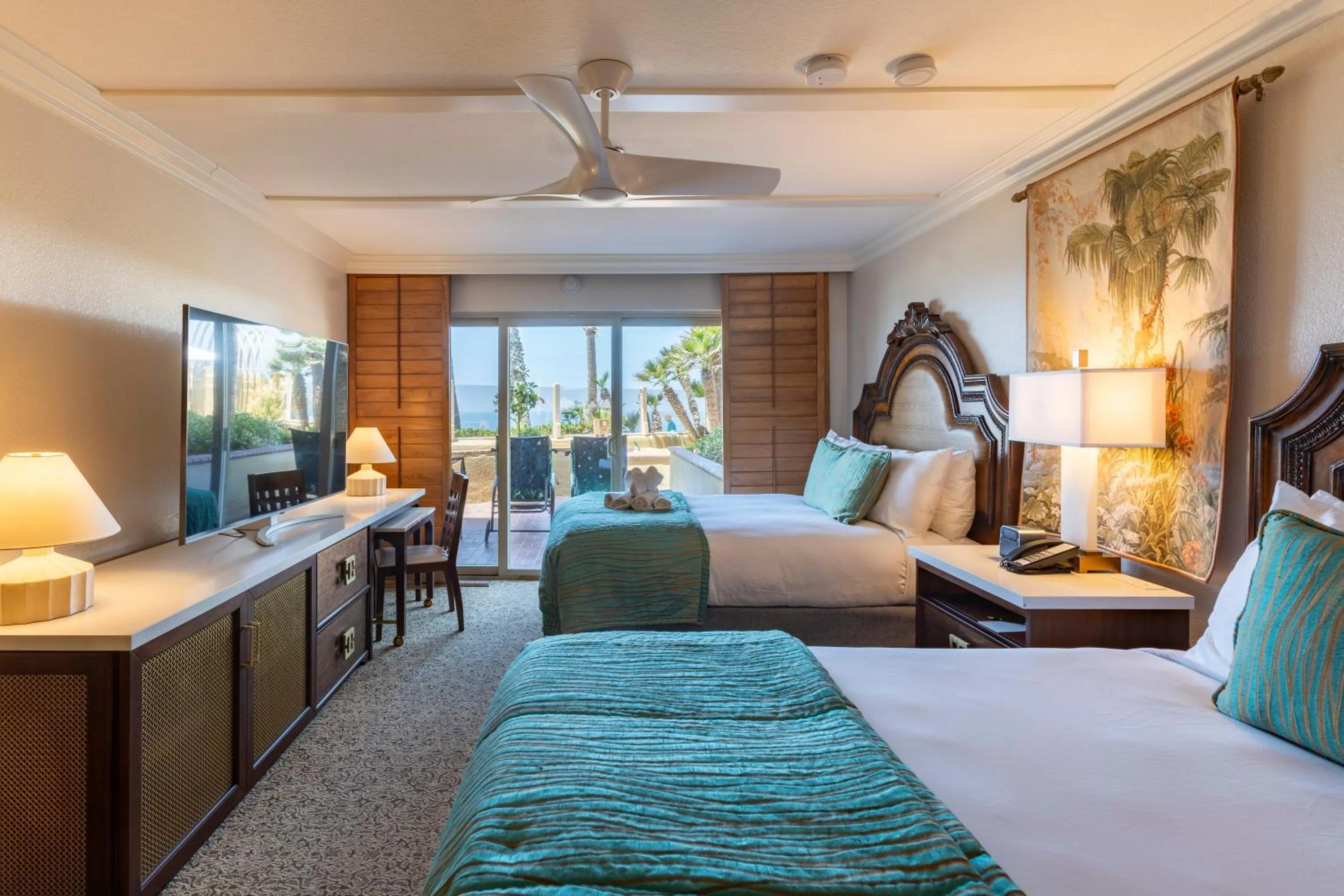 Bed in Pacific Terrace Hotel