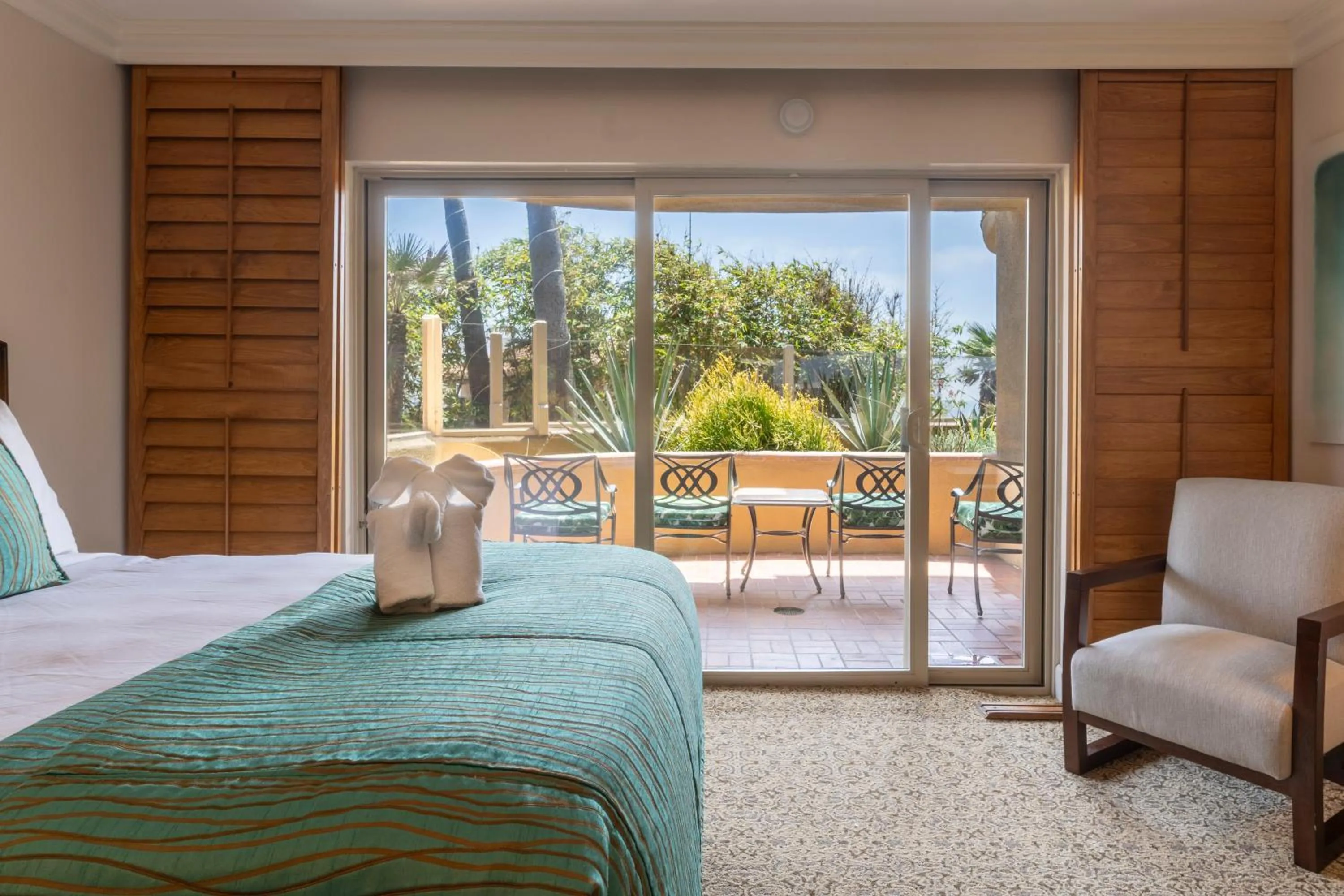 Bed in Pacific Terrace Hotel