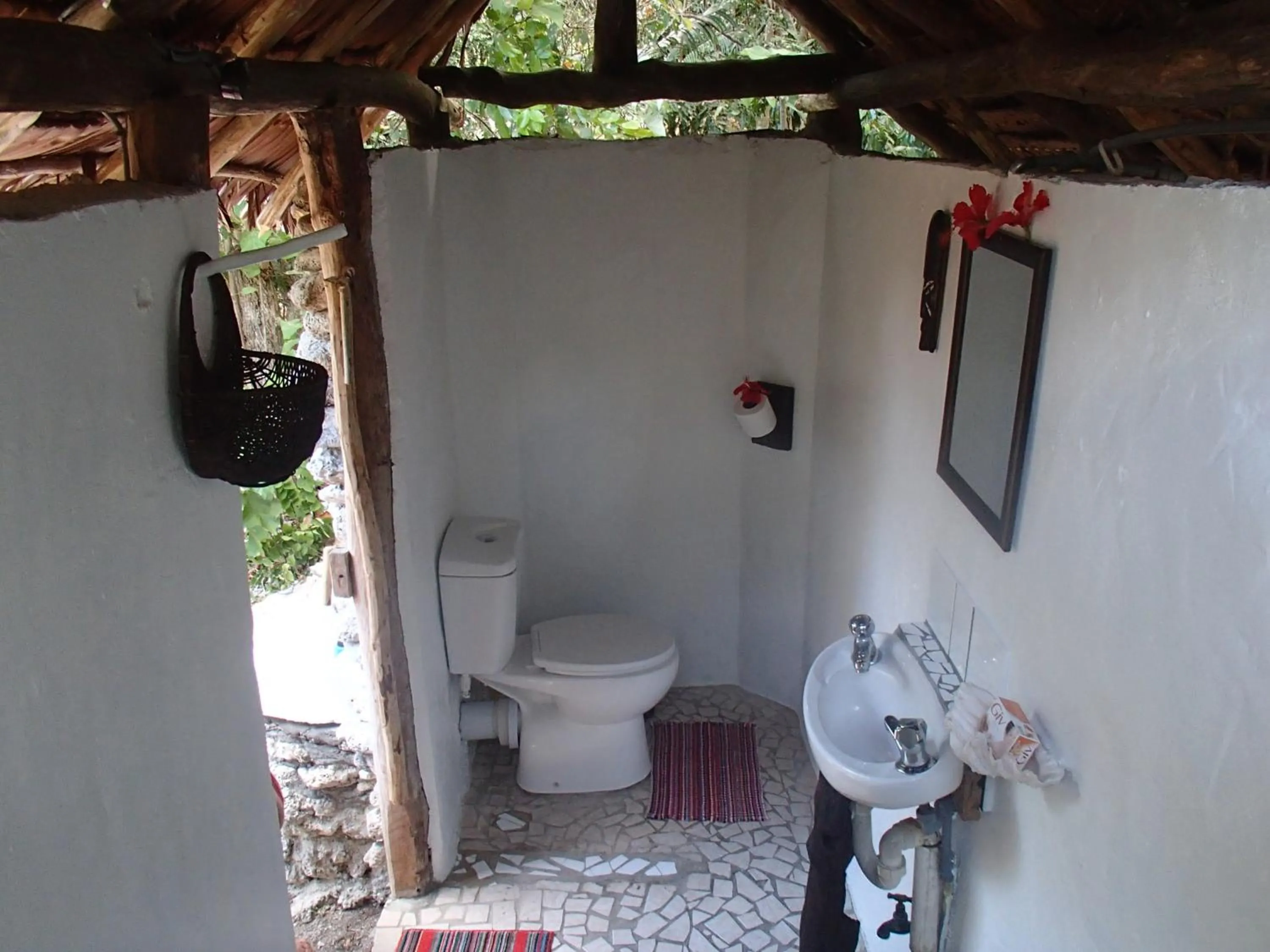 Bathroom in Tranquility Island Eco Dive Resort