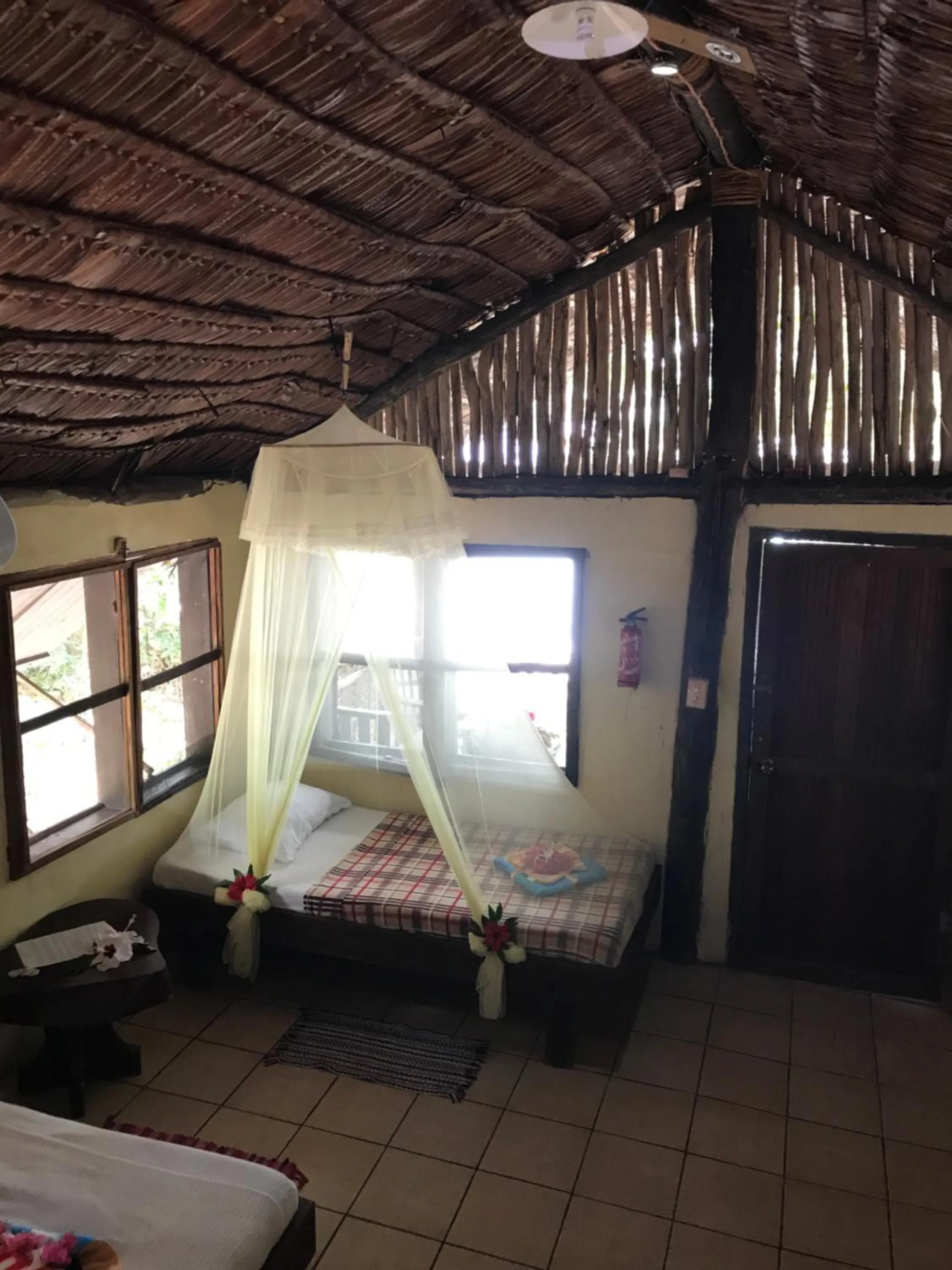 Bedroom, Bed in Tranquility Island Eco Dive Resort
