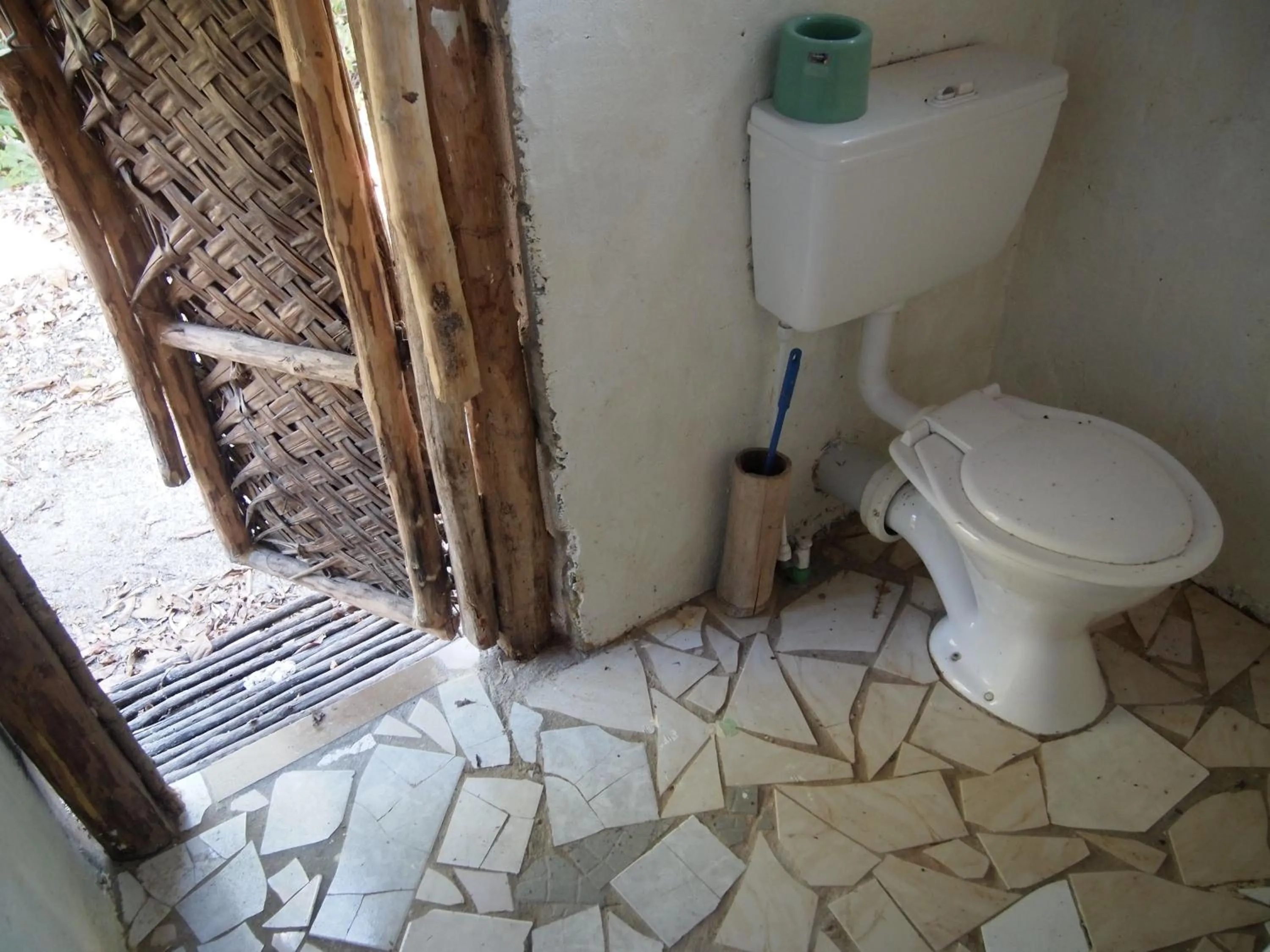 Toilet in Tranquility Island Eco Dive Resort