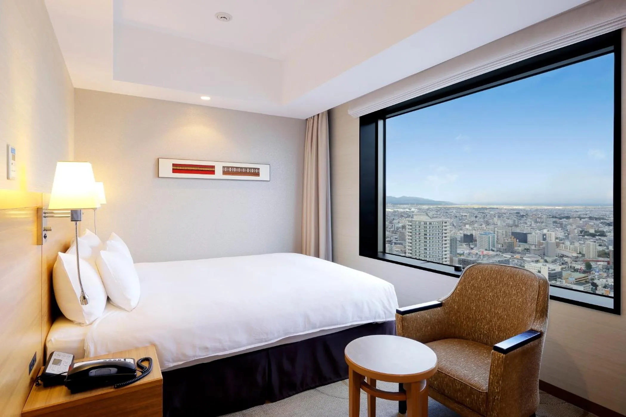 Photo of the whole room, Bed in JR Tower Hotel Nikko Sapporo