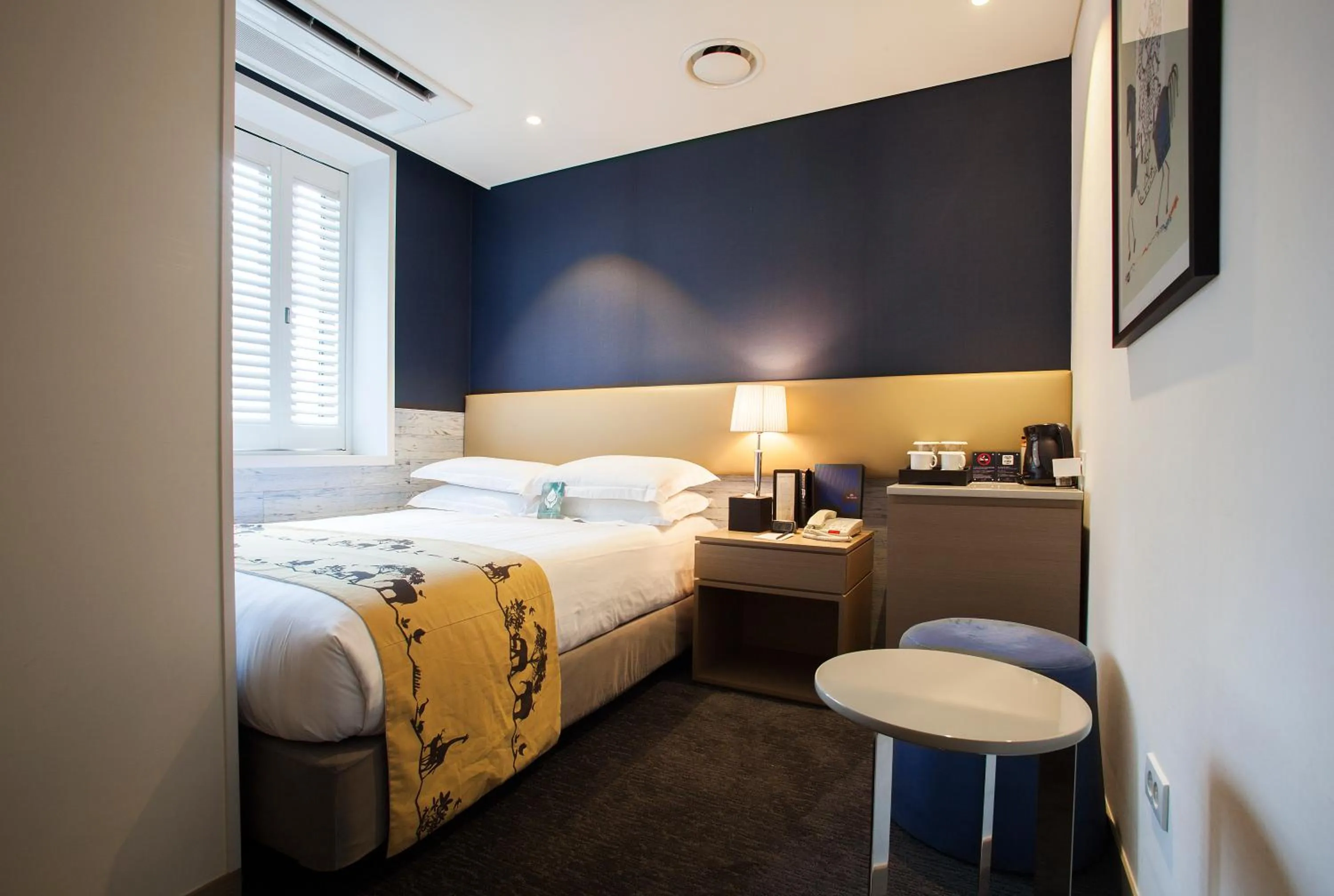 Photo of the whole room, Bed in The Grand Hotel Myeongdong