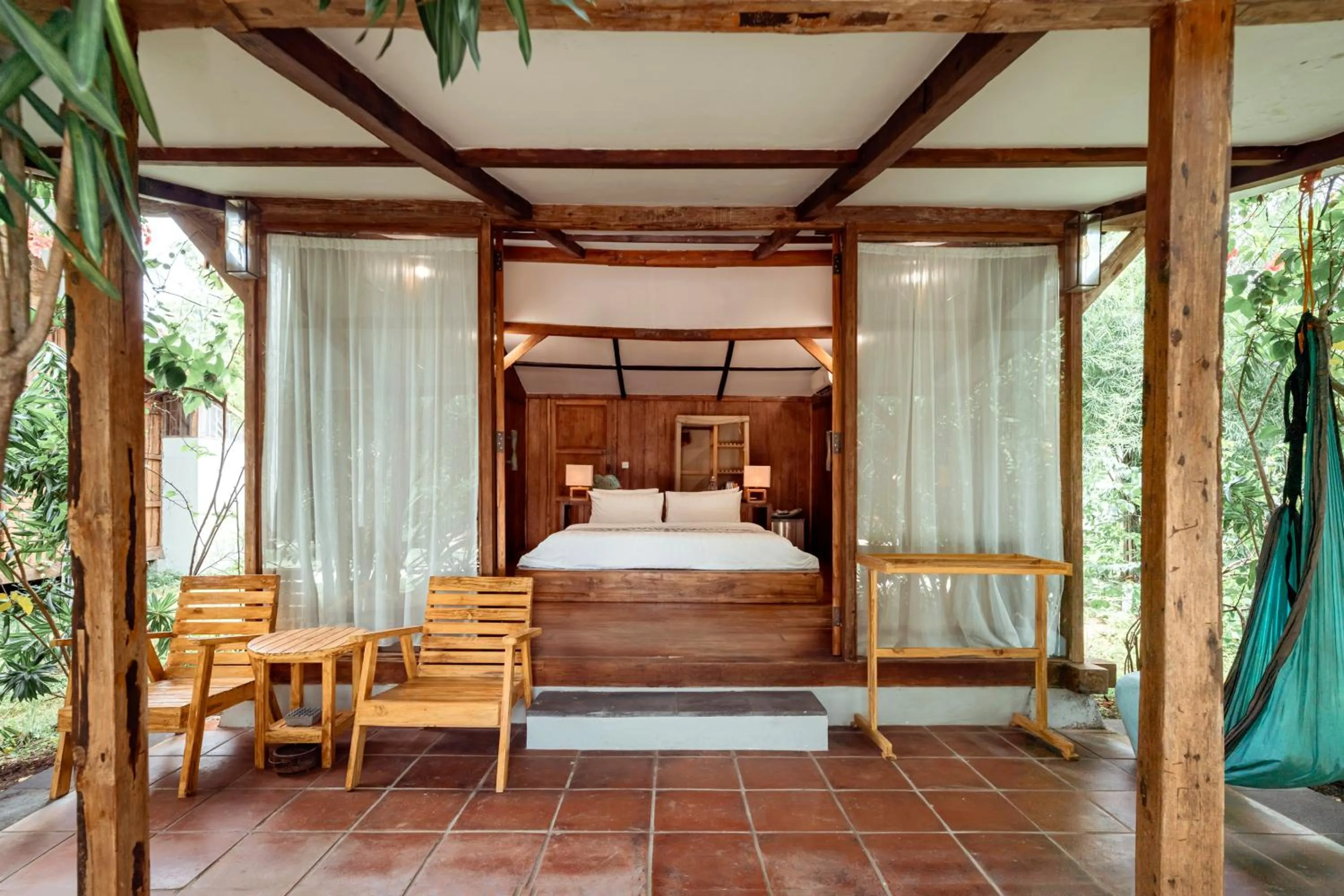 Patio, Bed in Coconut Garden Resort