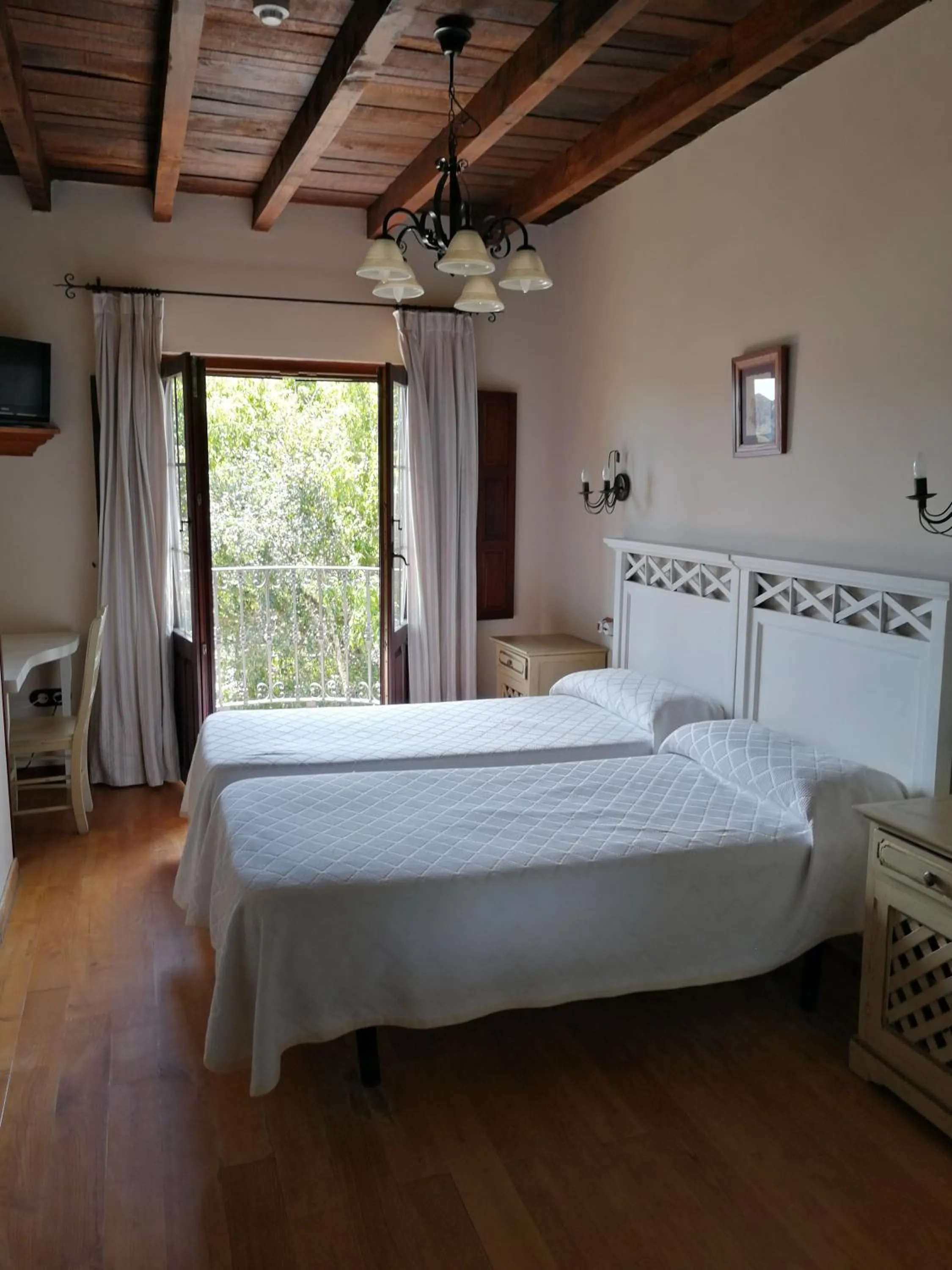 Bed in Posada El Jardin de Angela