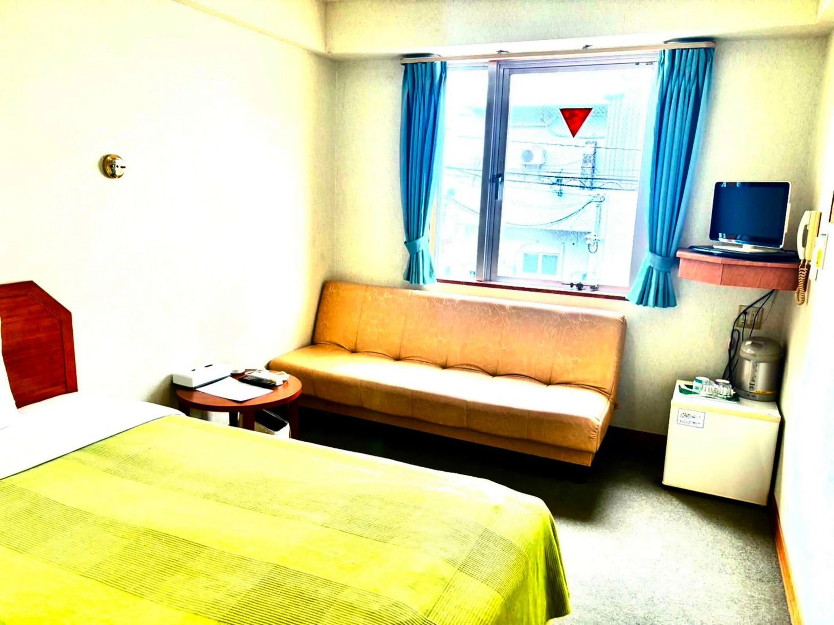 Bedroom, Bed in Hotel Happy Holiday Ishigaki