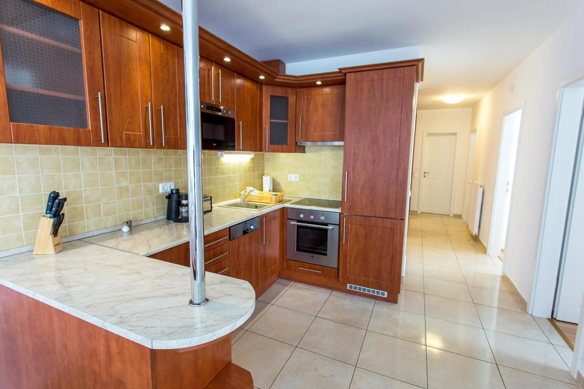 Kitchen or kitchenette in Luxury Apartment Hotel Siófok
