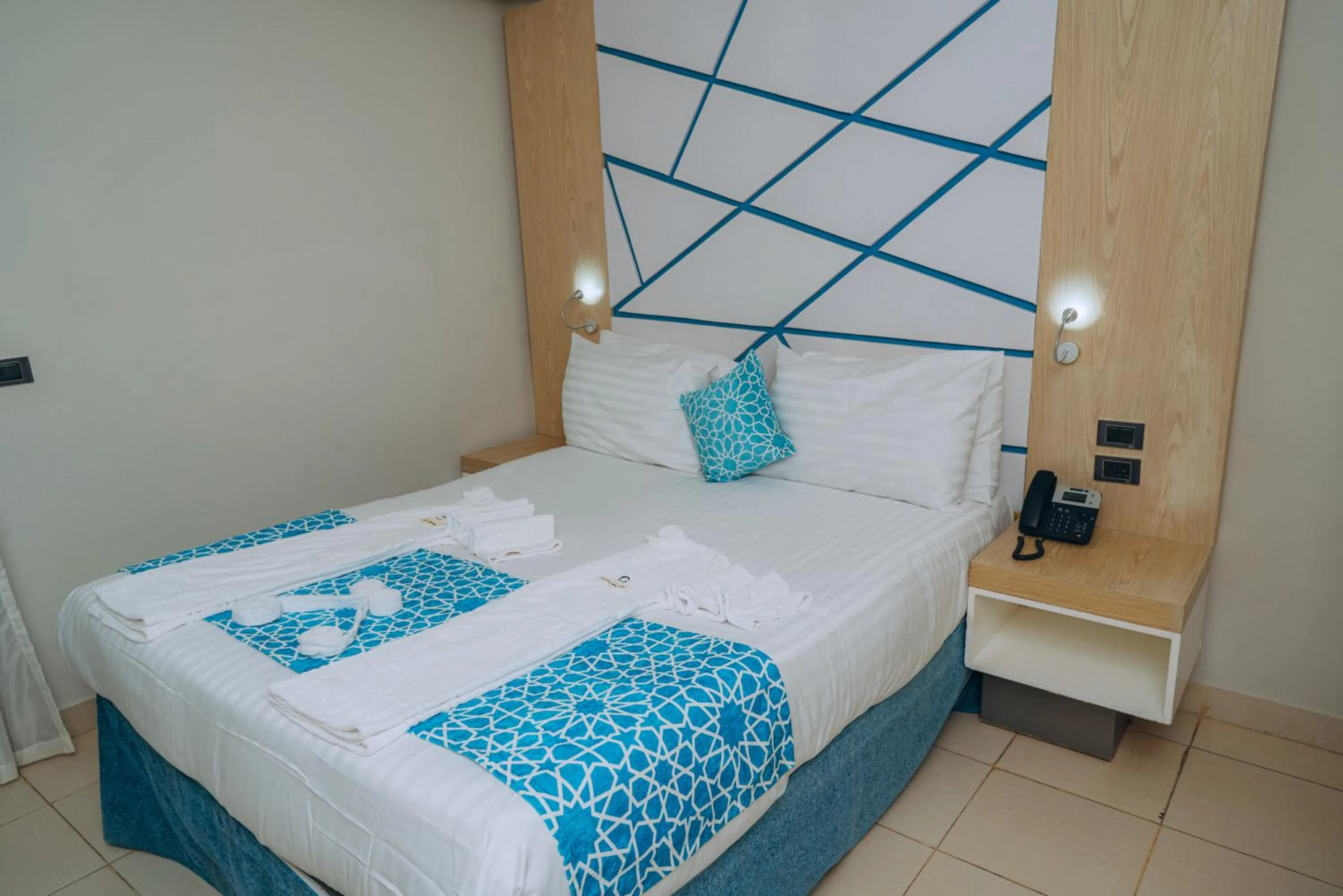 Bed in Gravity Hotel & Aqua Park Sahl Hasheesh Families and Couples Only