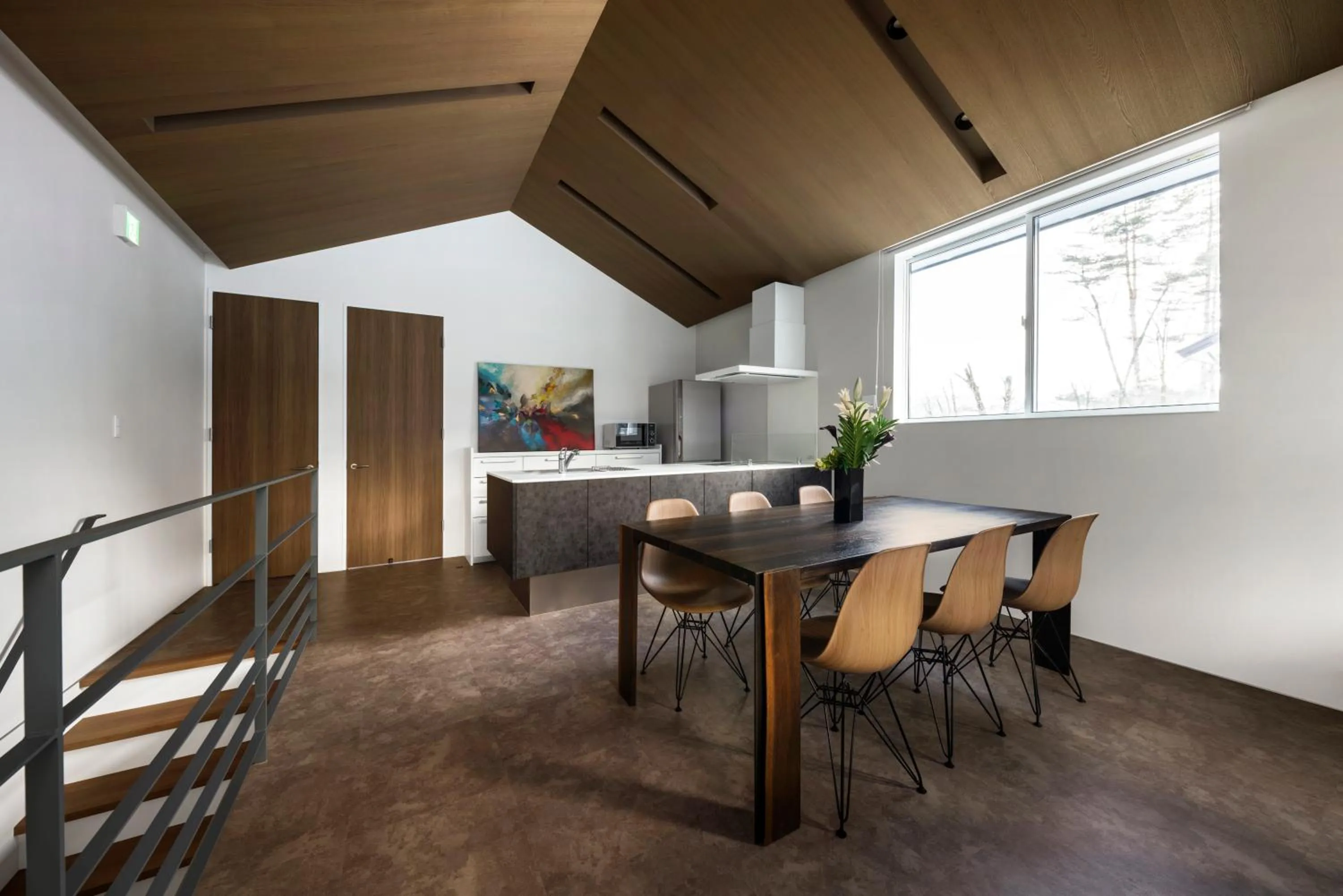 Dining area in Grey Wolf Chalet by Hakuba White Fox Company