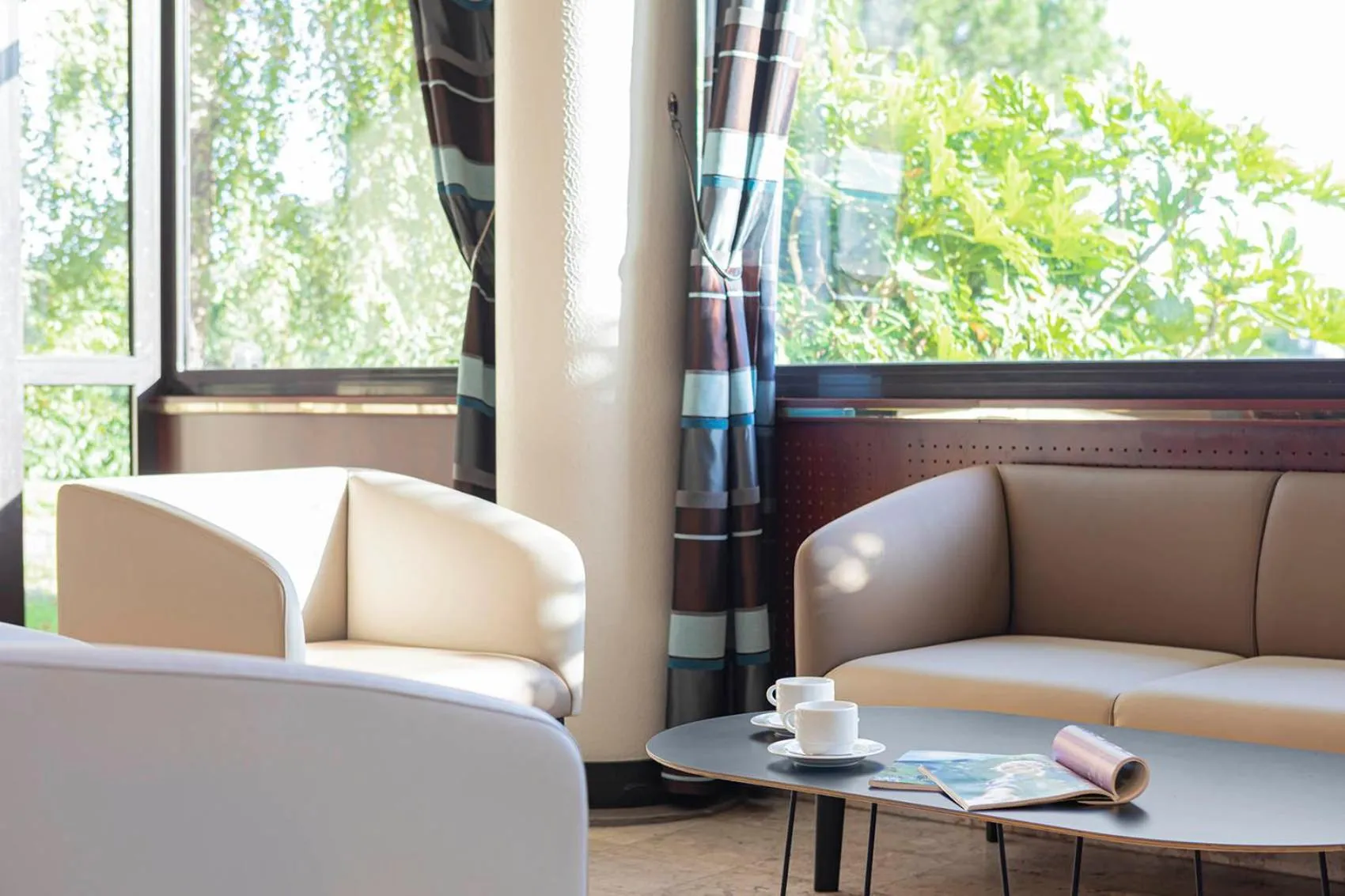 Living room in Logis Lyon Est Porte de l'Ain