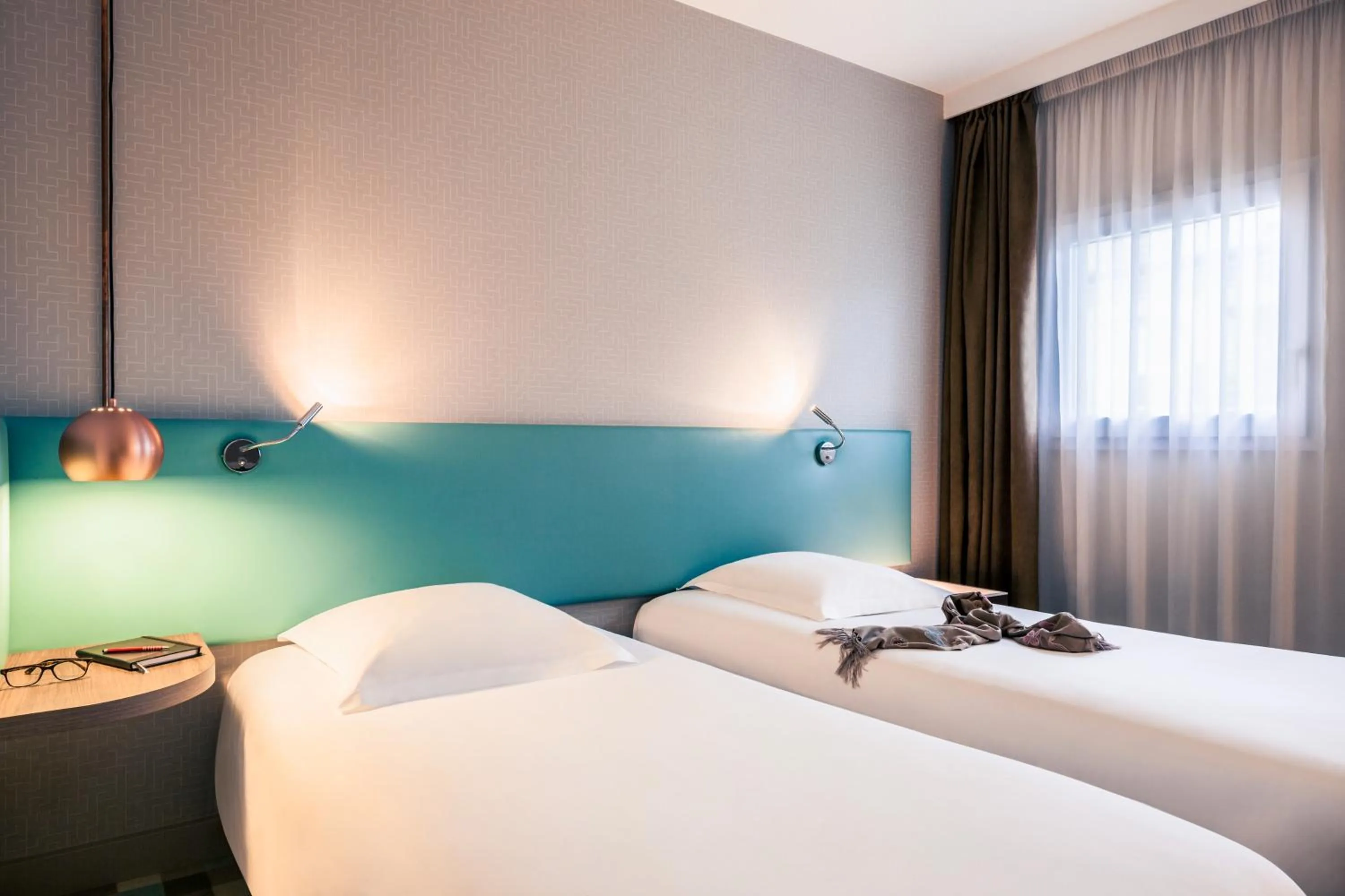 Bed in Hôtel Mercure Marne-la-Vallée Bussy St Georges