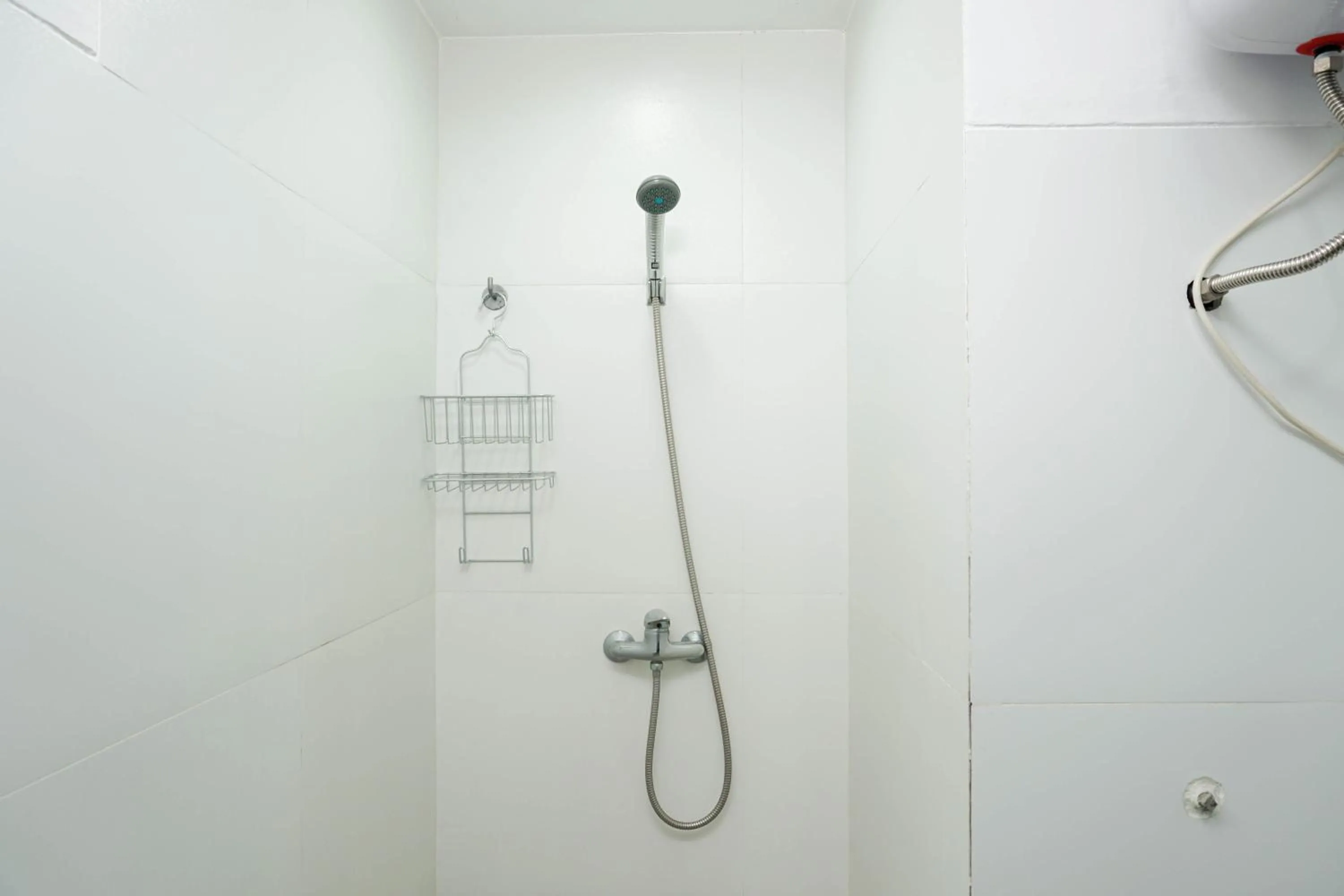 Bathroom in Spacious 3BR Ambassade Kuningan Apartment By Travelio