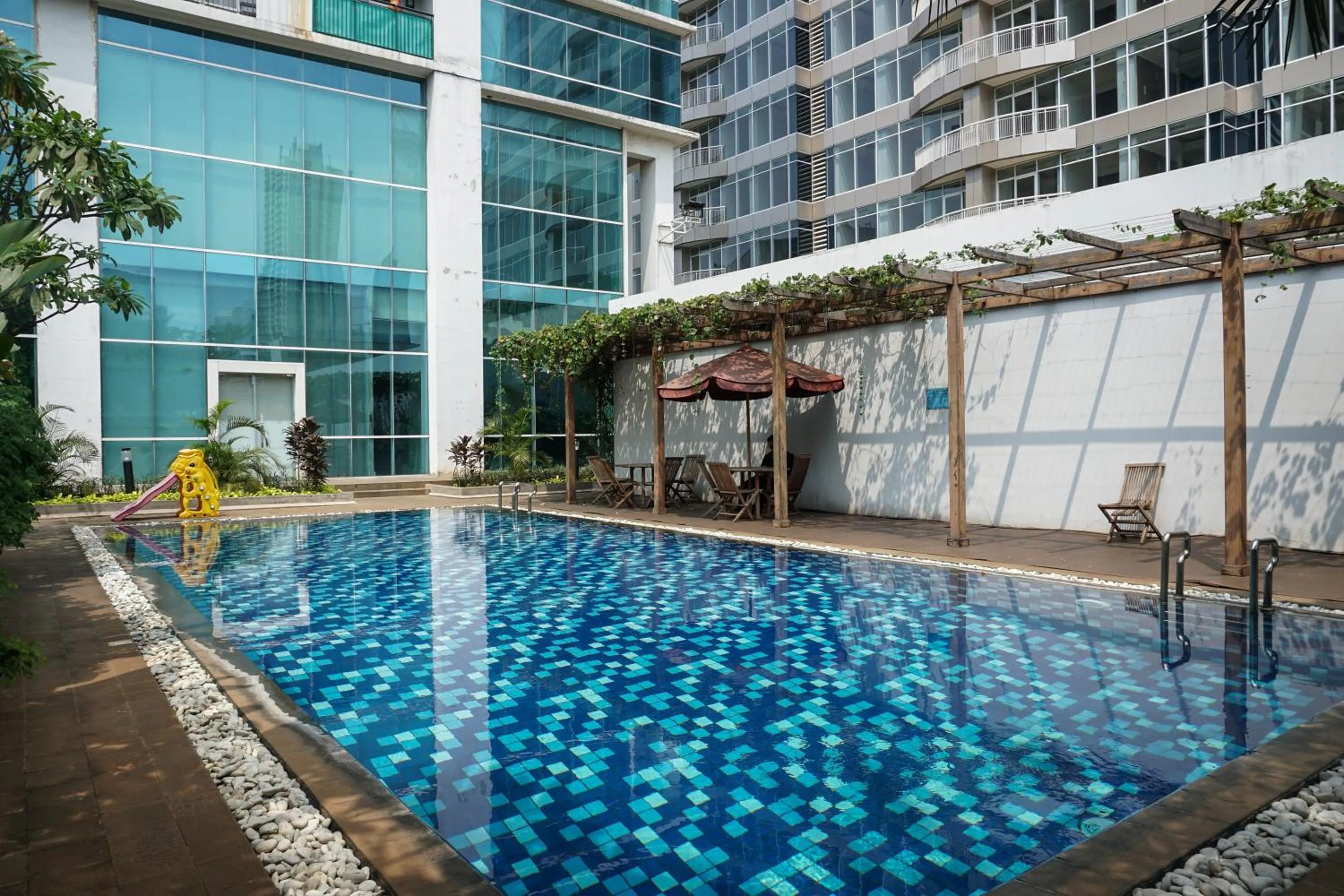 Spacious 3BR Ambassade Kuningan Apartment By Travelio
