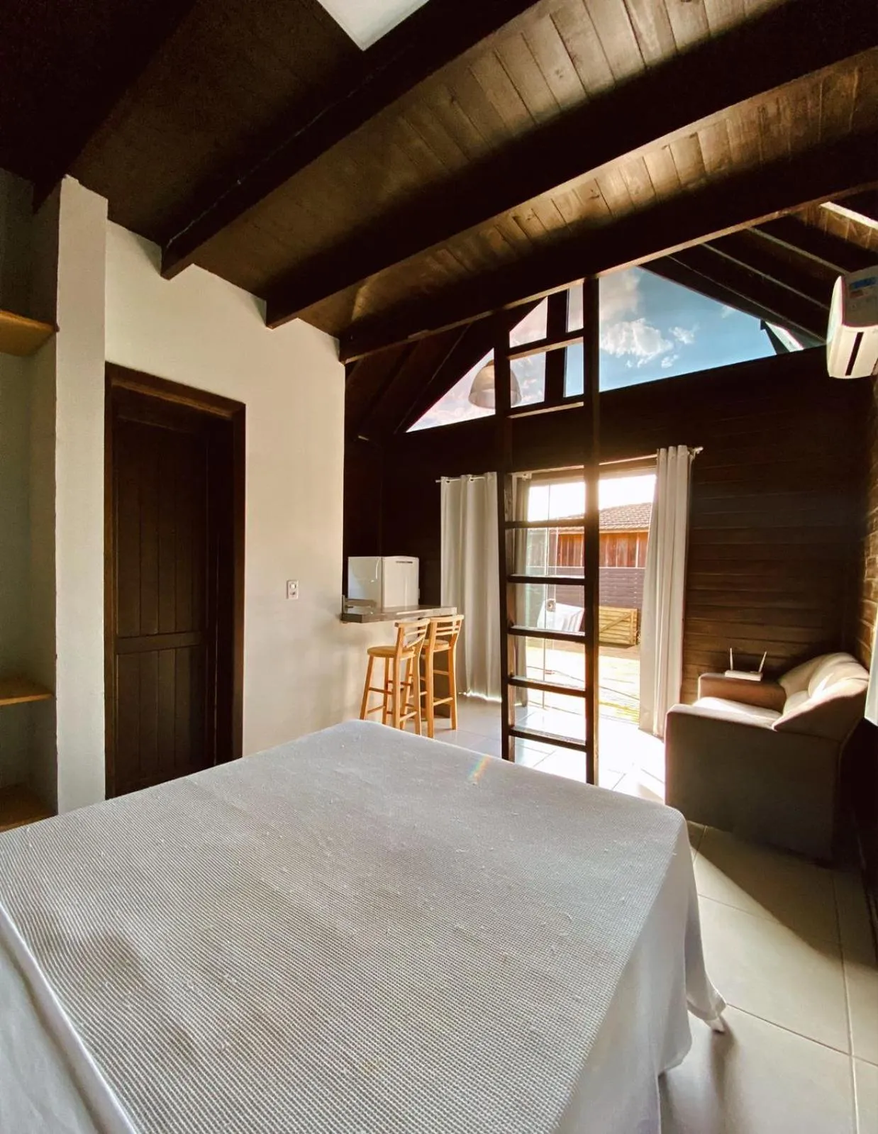 Bed in Pousada Cabanas Kaia Lua