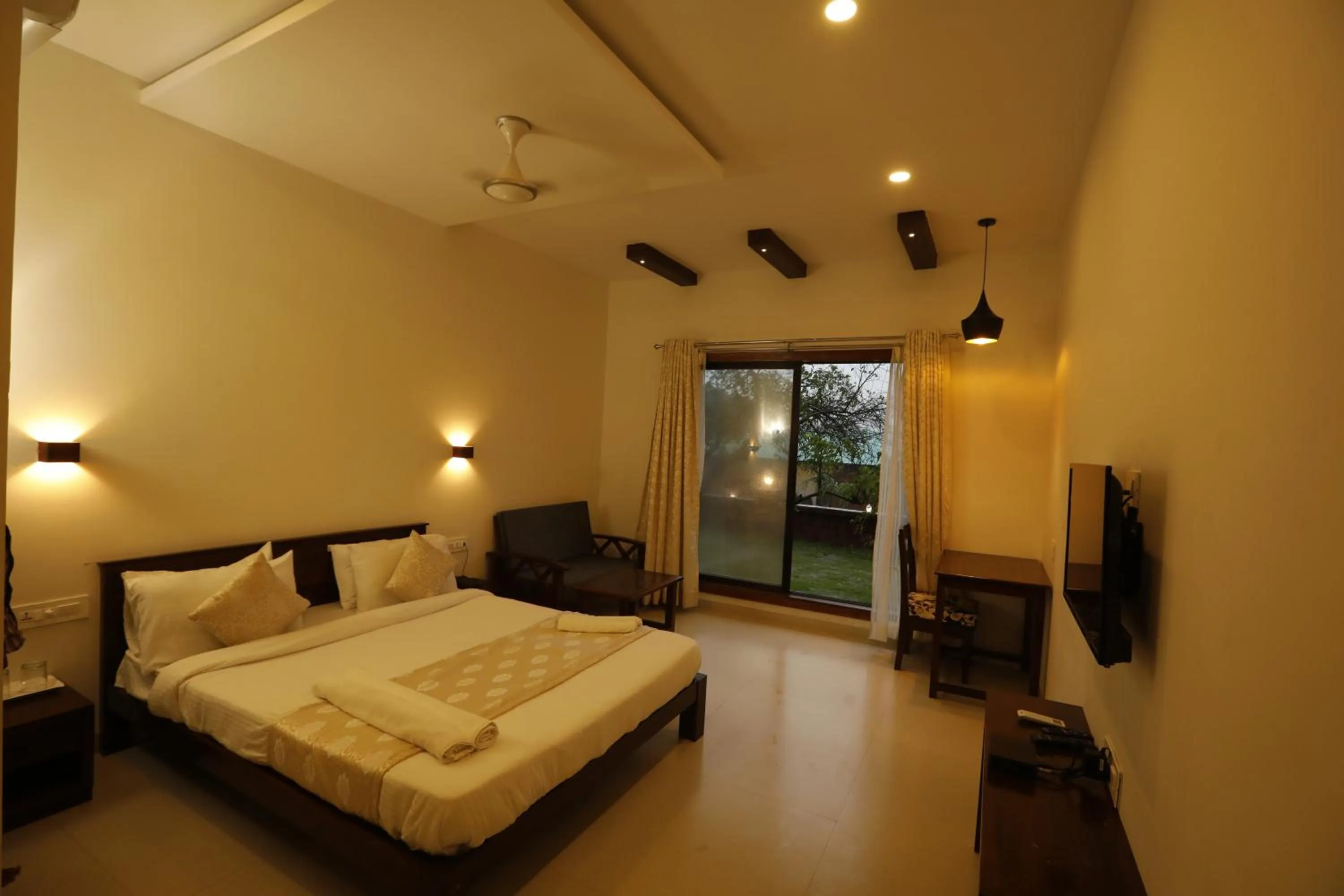 Garden view, Bed in La Serene Resort and Spa