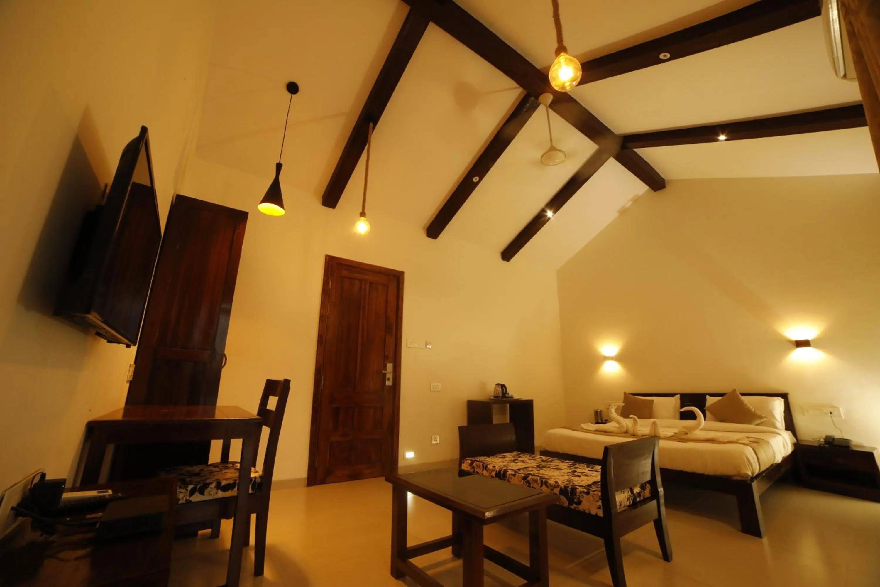 Living room, Bed in La Serene Resort and Spa