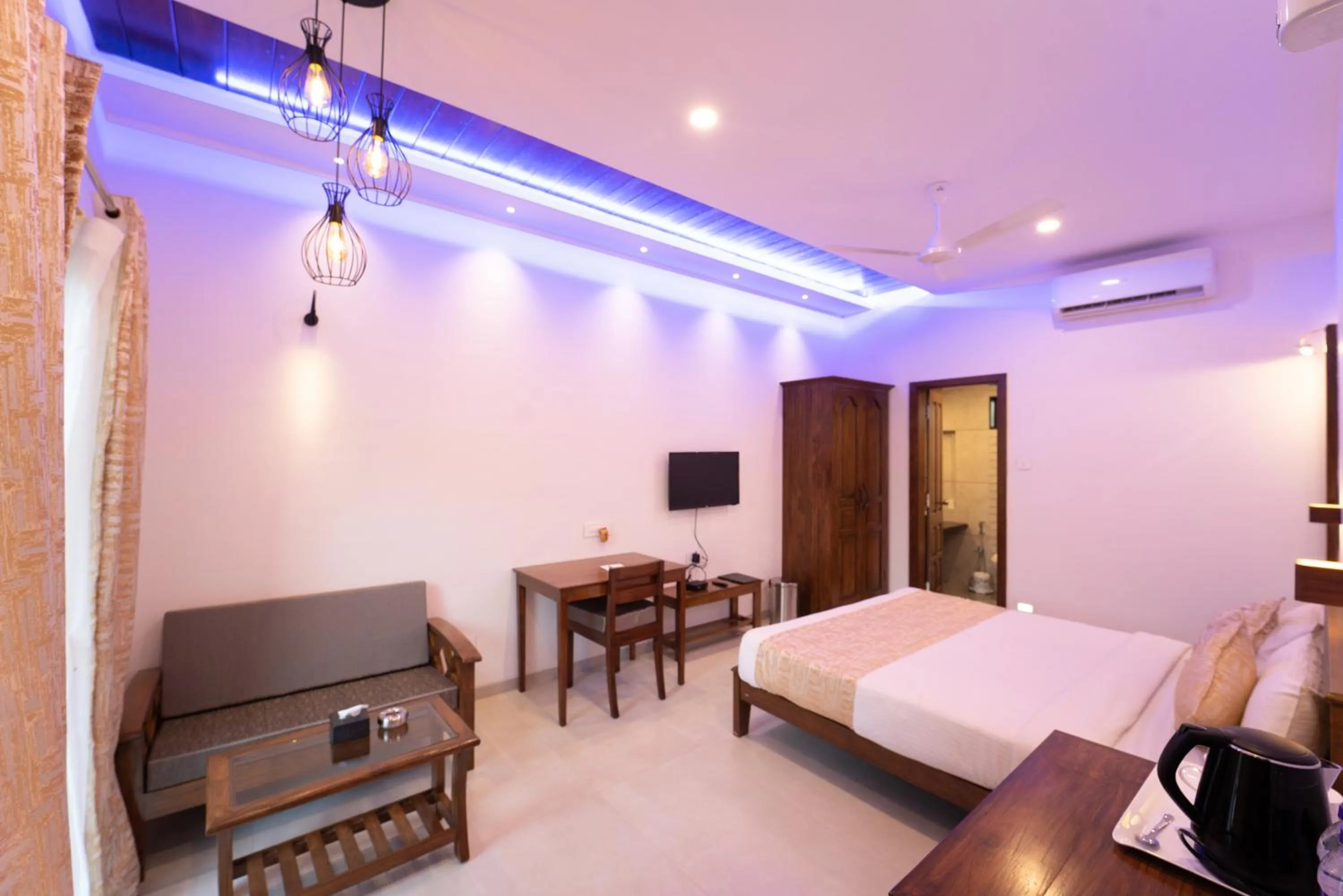 Bed in La Serene Resort and Spa