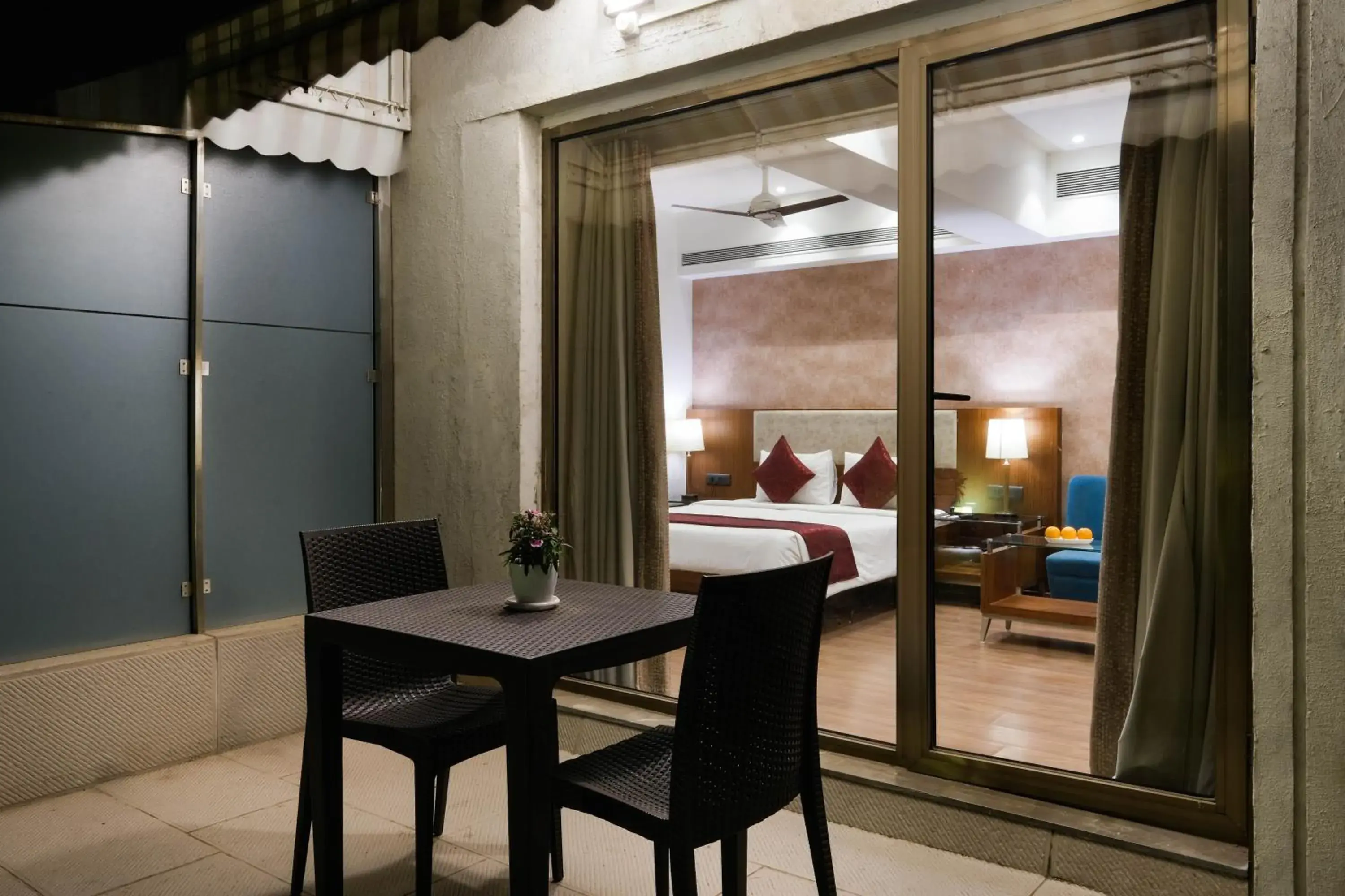 Patio, Bed in 7 Apple Hotel - Viman Nagar Pune Patio, Bed in 7 Apple Hotel - Viman Nagar Pune