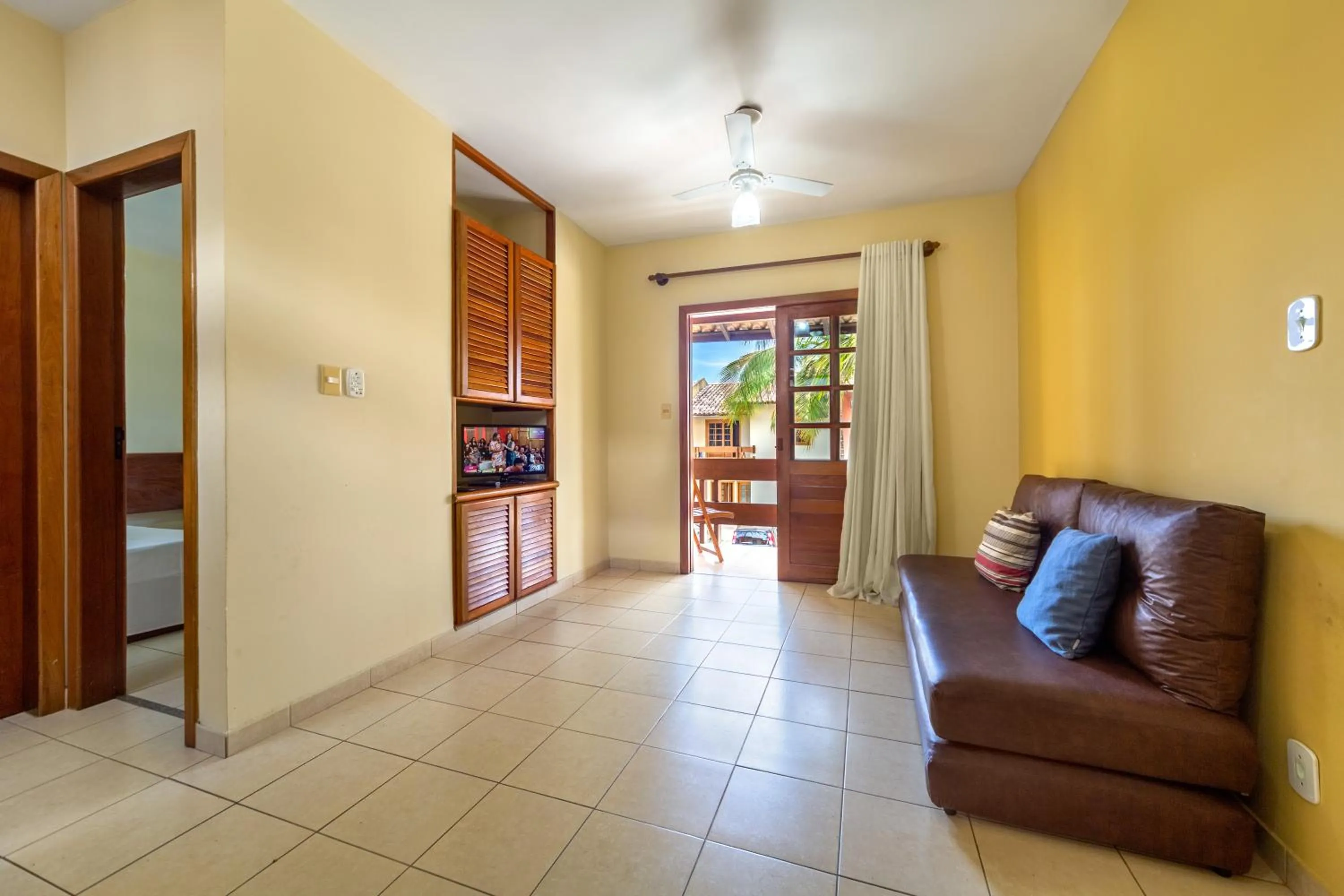 Living room in America Praia Flat - Portal Hotéis