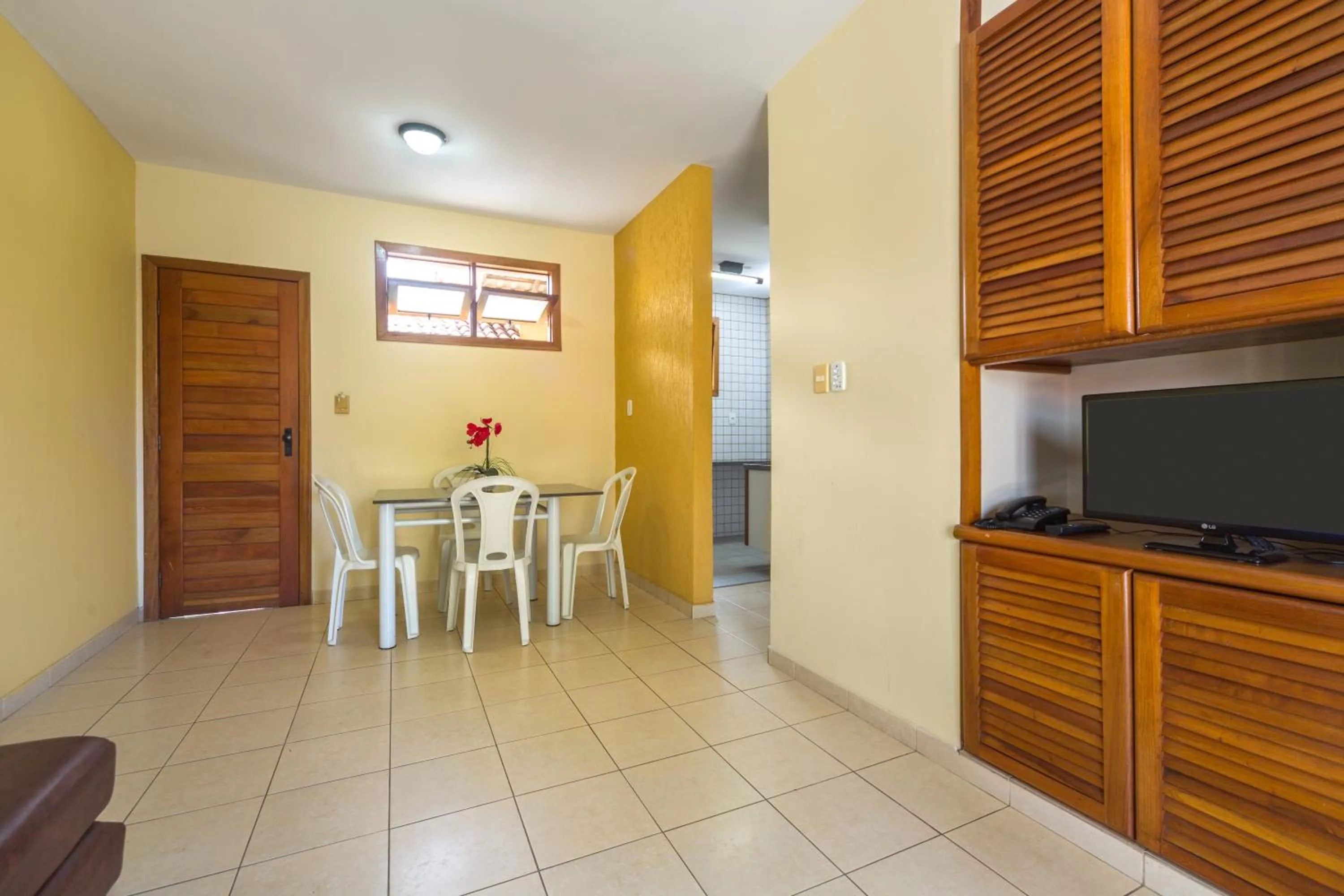 Dining area in America Praia Flat - Portal Hotéis