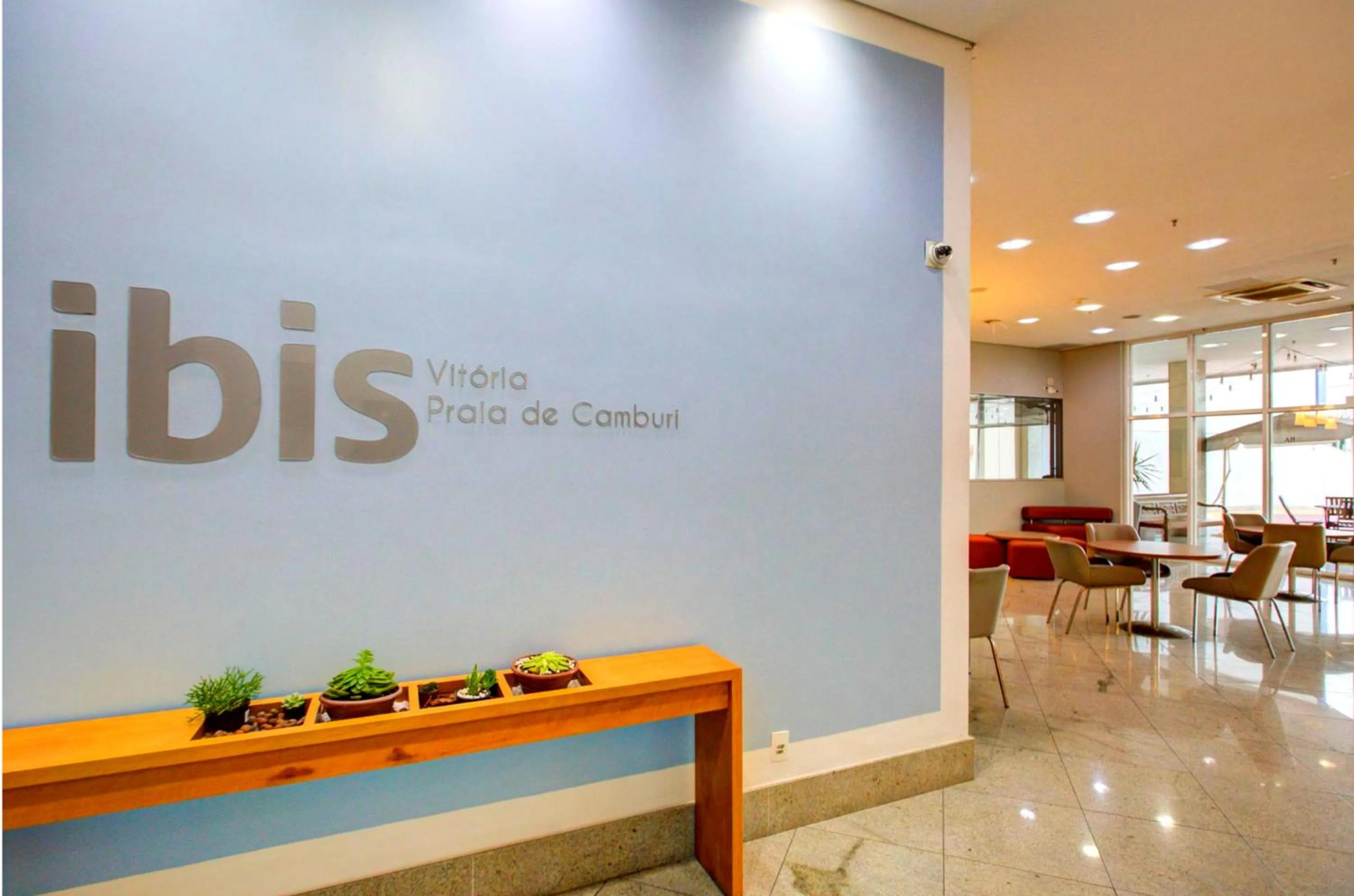 Property logo or sign in ibis Vitoria Praia de Camburi