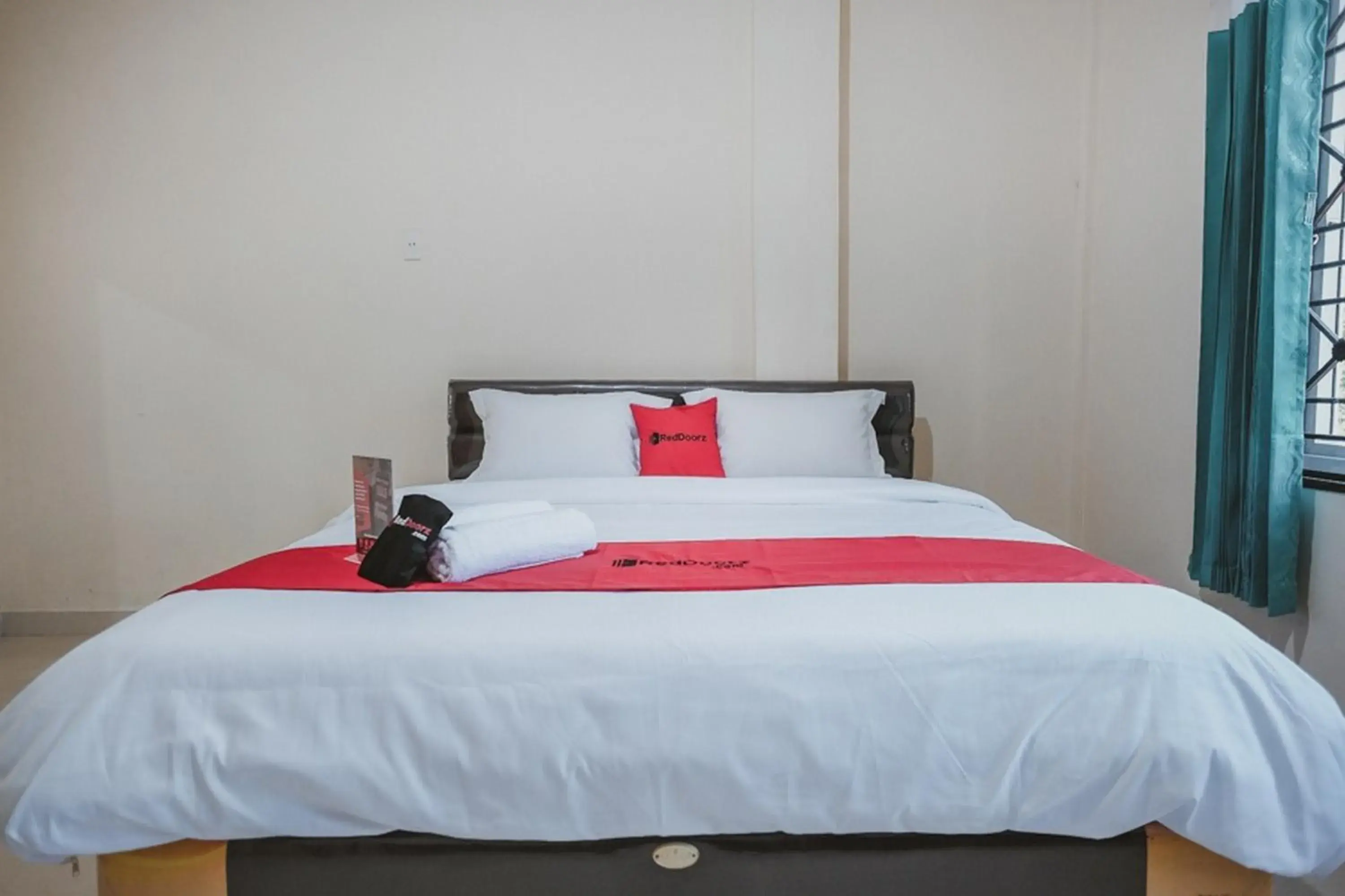 Bedroom in RedDoorz near Ringroad City Walks Medan Bedroom in RedDoorz near Ringroad City Walks Medan