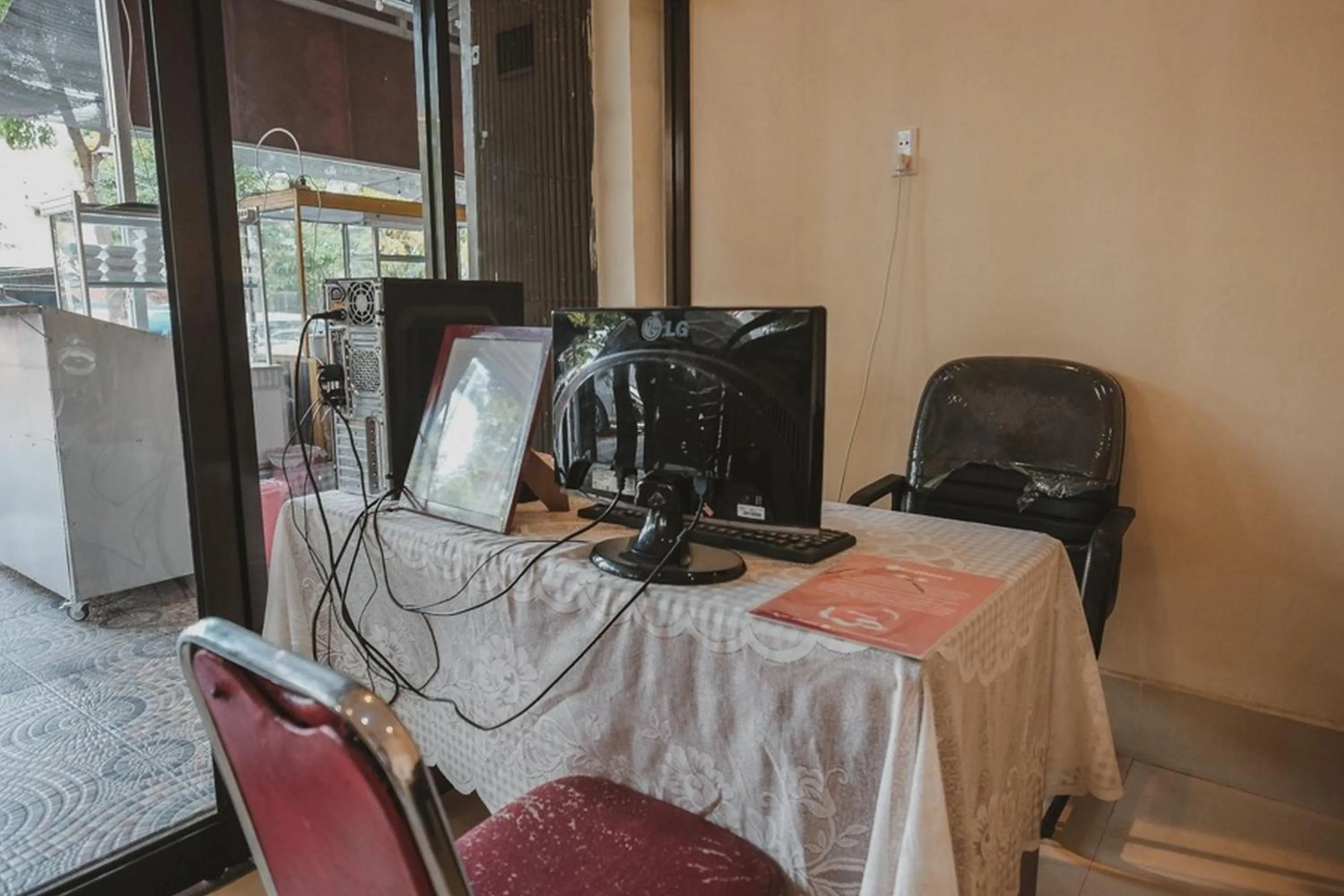 Property logo or sign in RedDoorz near Ringroad City Walks Medan