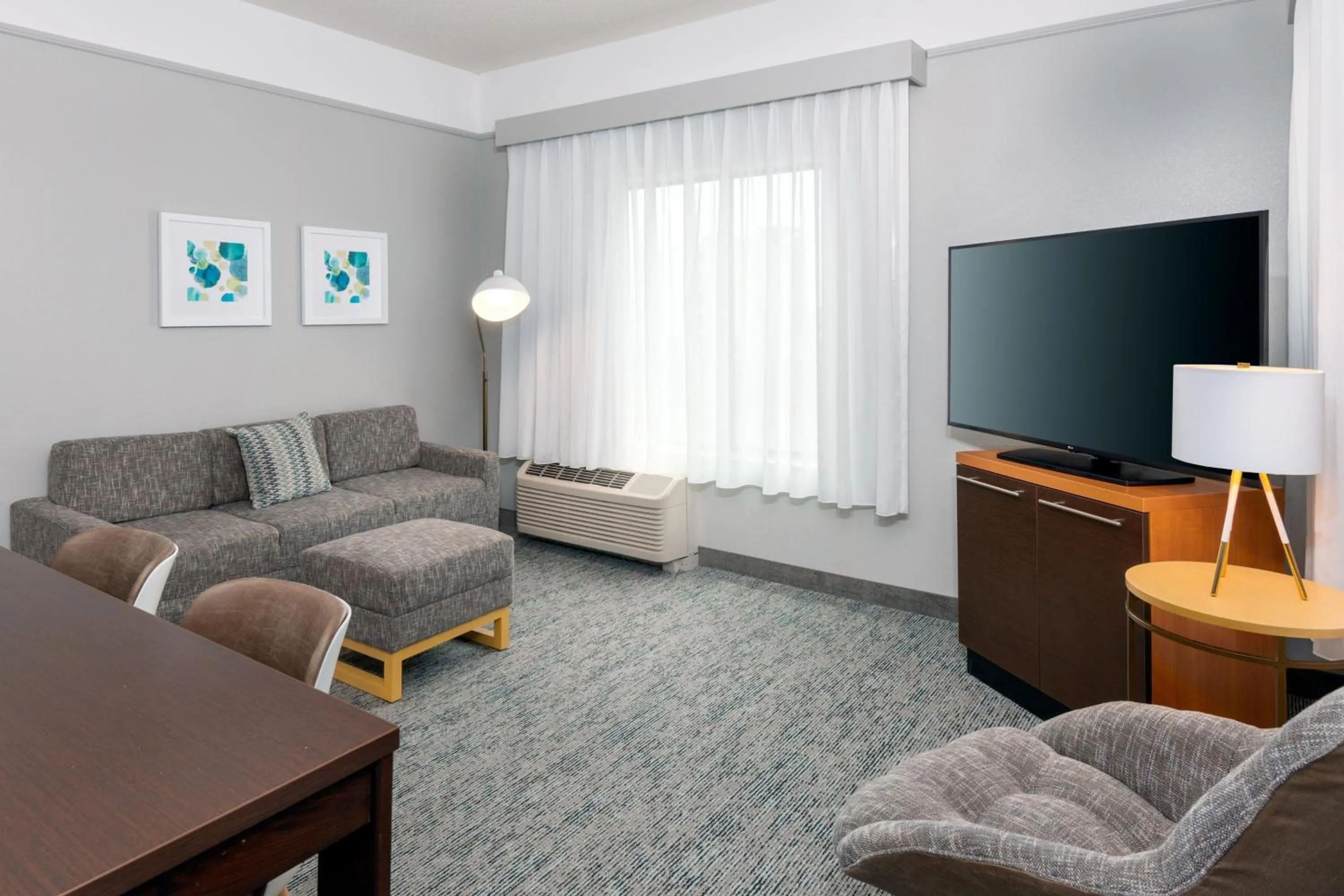 Living room in TownePlace Suites Buffalo Airport