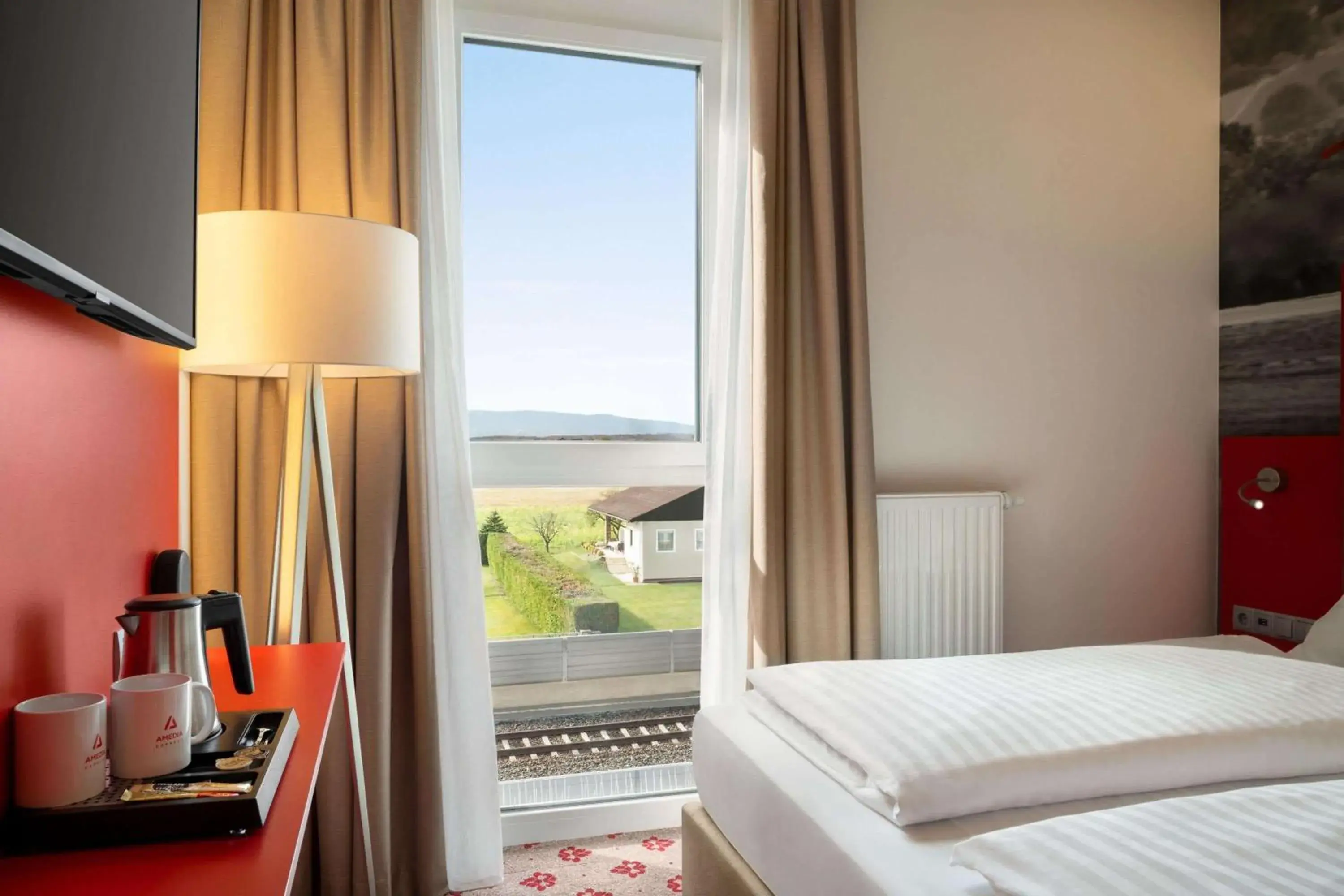 Photo of the whole room, Bed in Amedia Express Graz Airport, Trademark Collection by Wyndham Photo of the whole room, Bed in Amedia Express Graz Airport, Trademark Collection by Wyndham