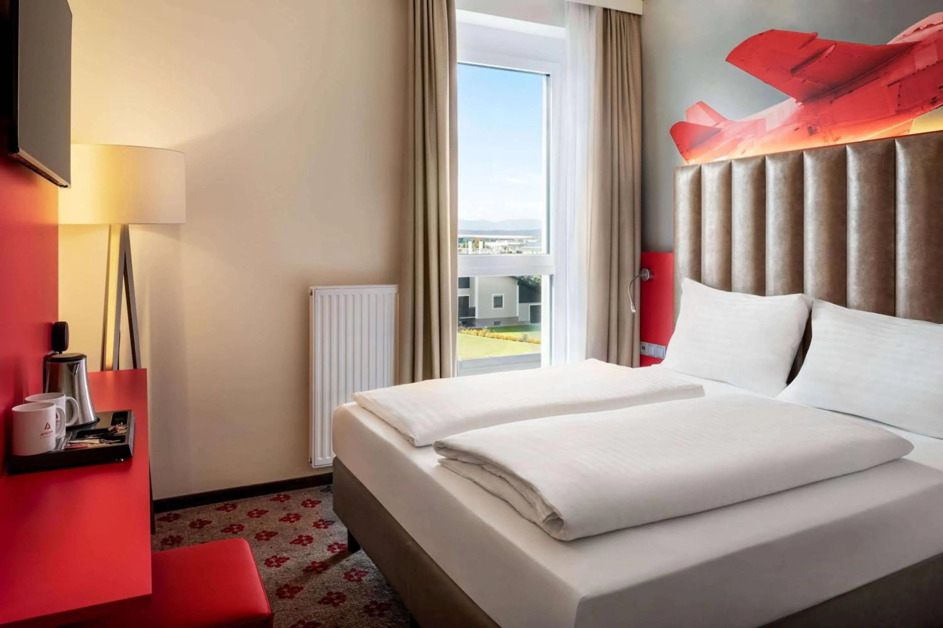 Photo of the whole room, Bed in Amedia Express Graz Airport, Trademark Collection by Wyndham
