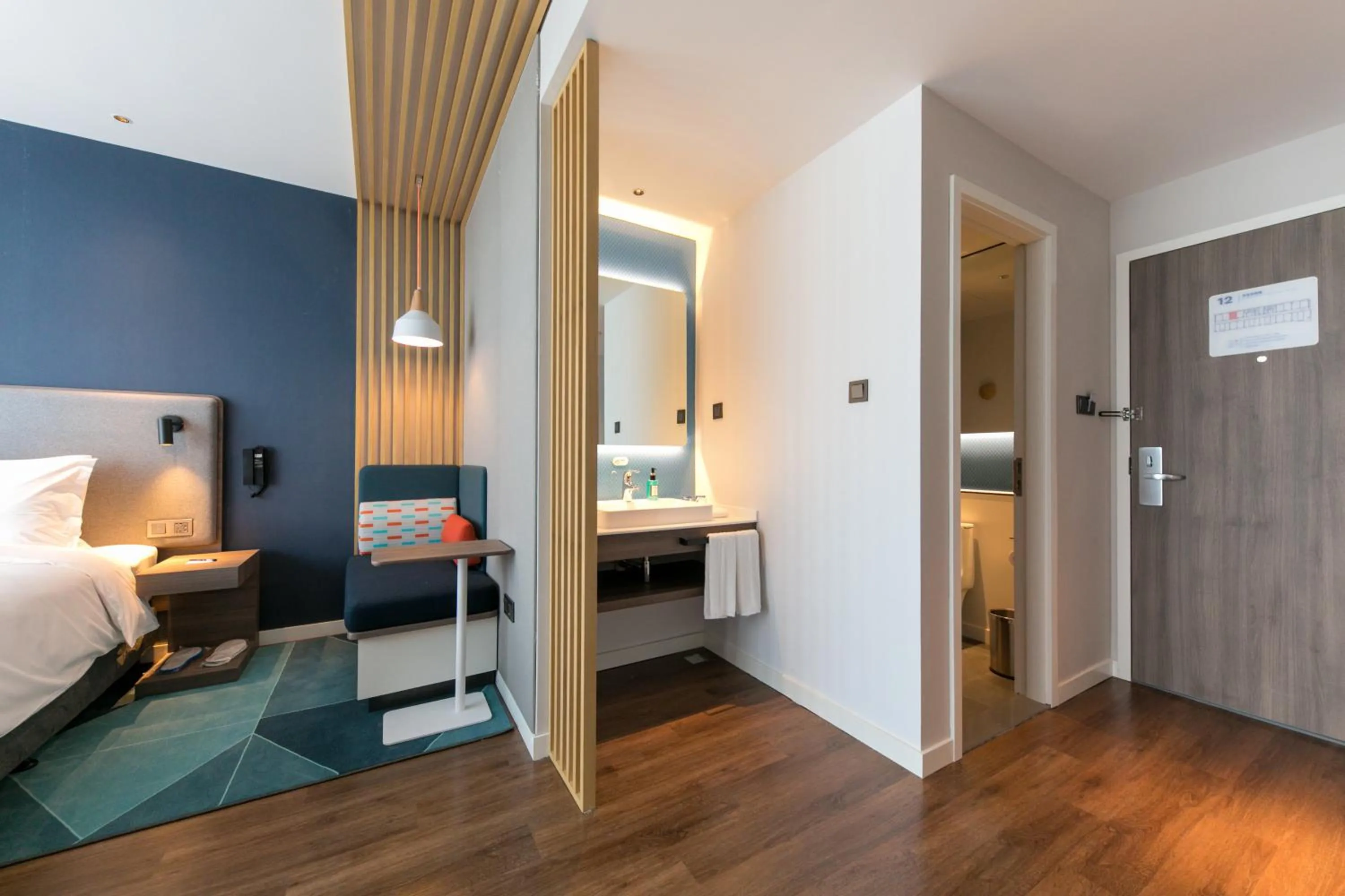 Photo of the whole room, Bed in Holiday Inn Express Shanghai Tangzhen, an IHG Hotel