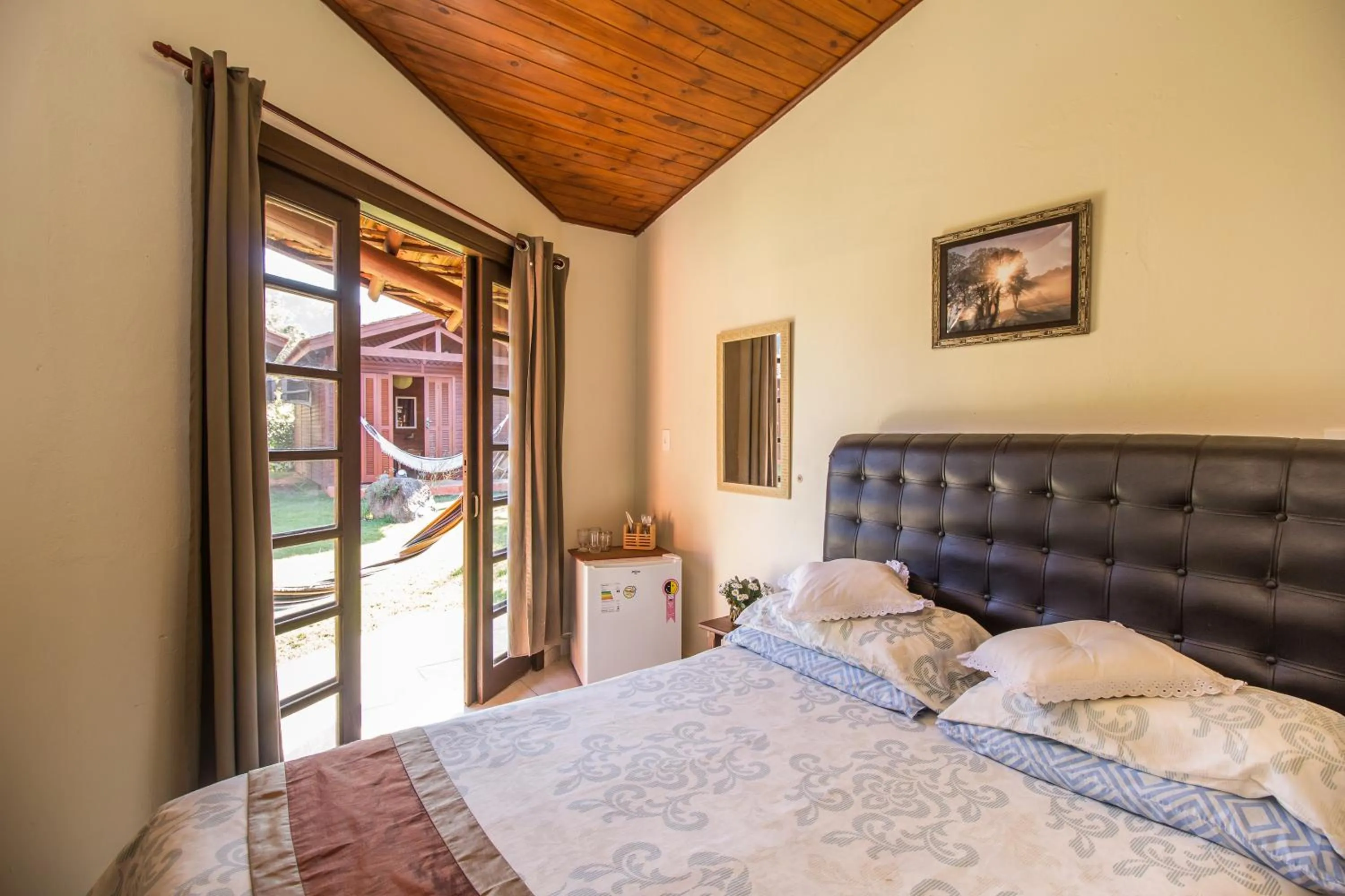 Bed in Green Mountain Pousada