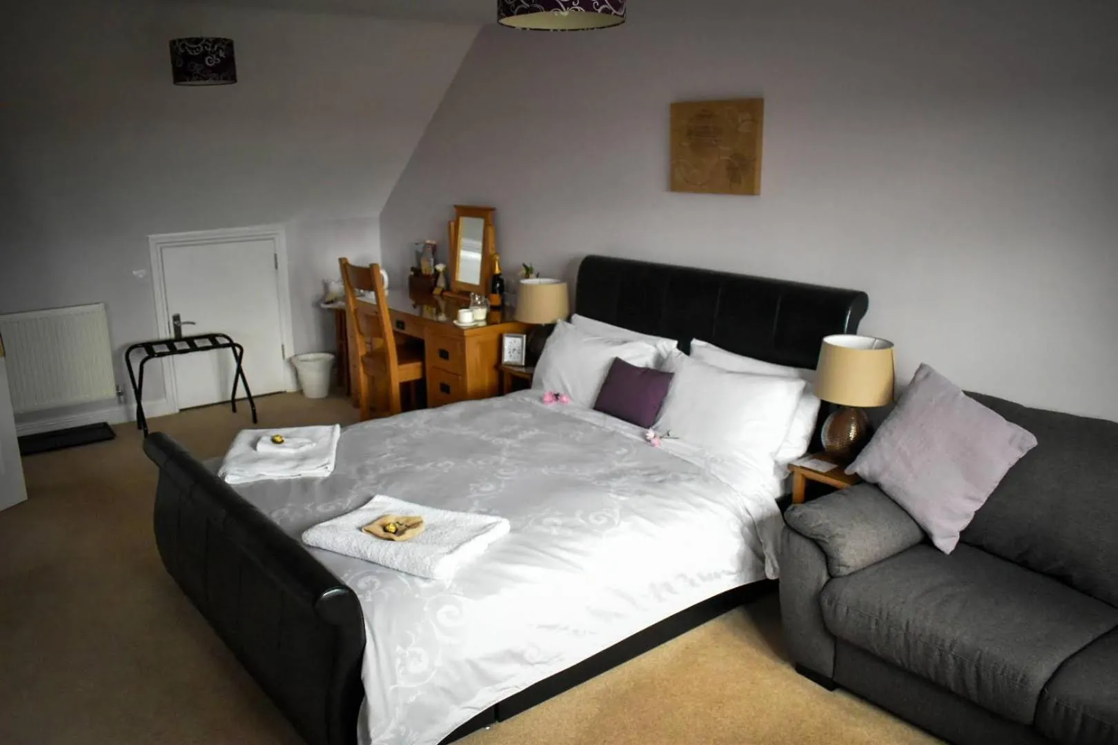 Bed in TLC Exmouth Bed and Breakfast