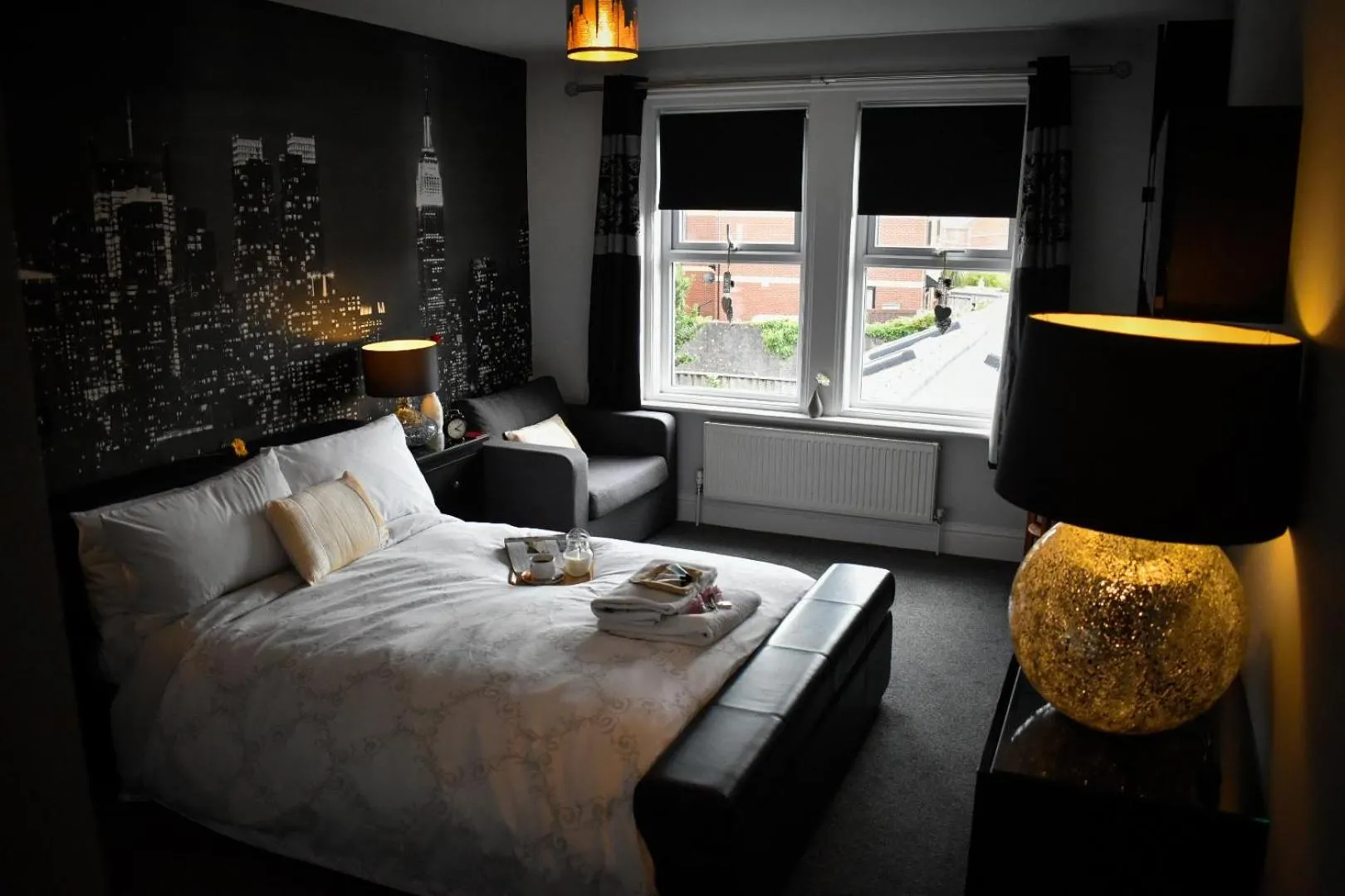 Bed in TLC Exmouth Bed and Breakfast