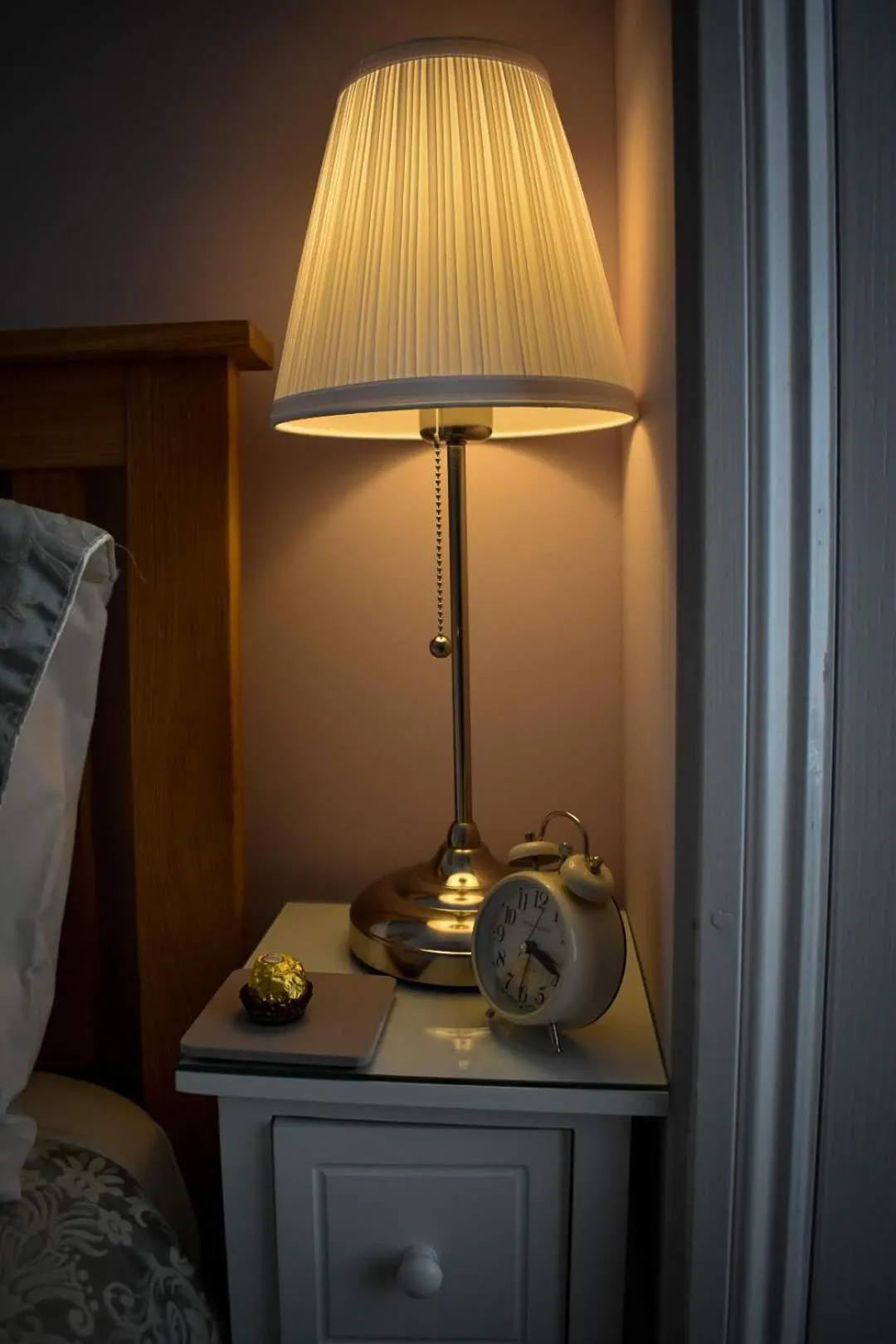 Bed in TLC Exmouth Bed and Breakfast