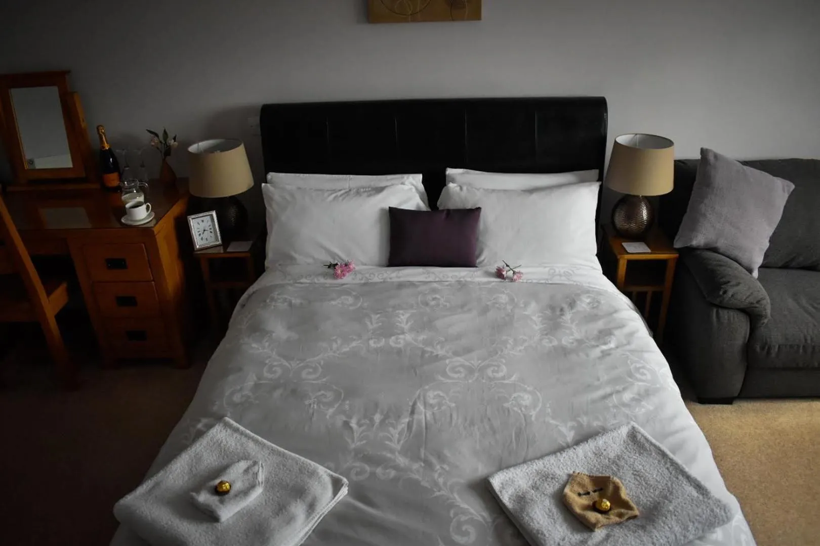 Bed in TLC Exmouth Bed and Breakfast