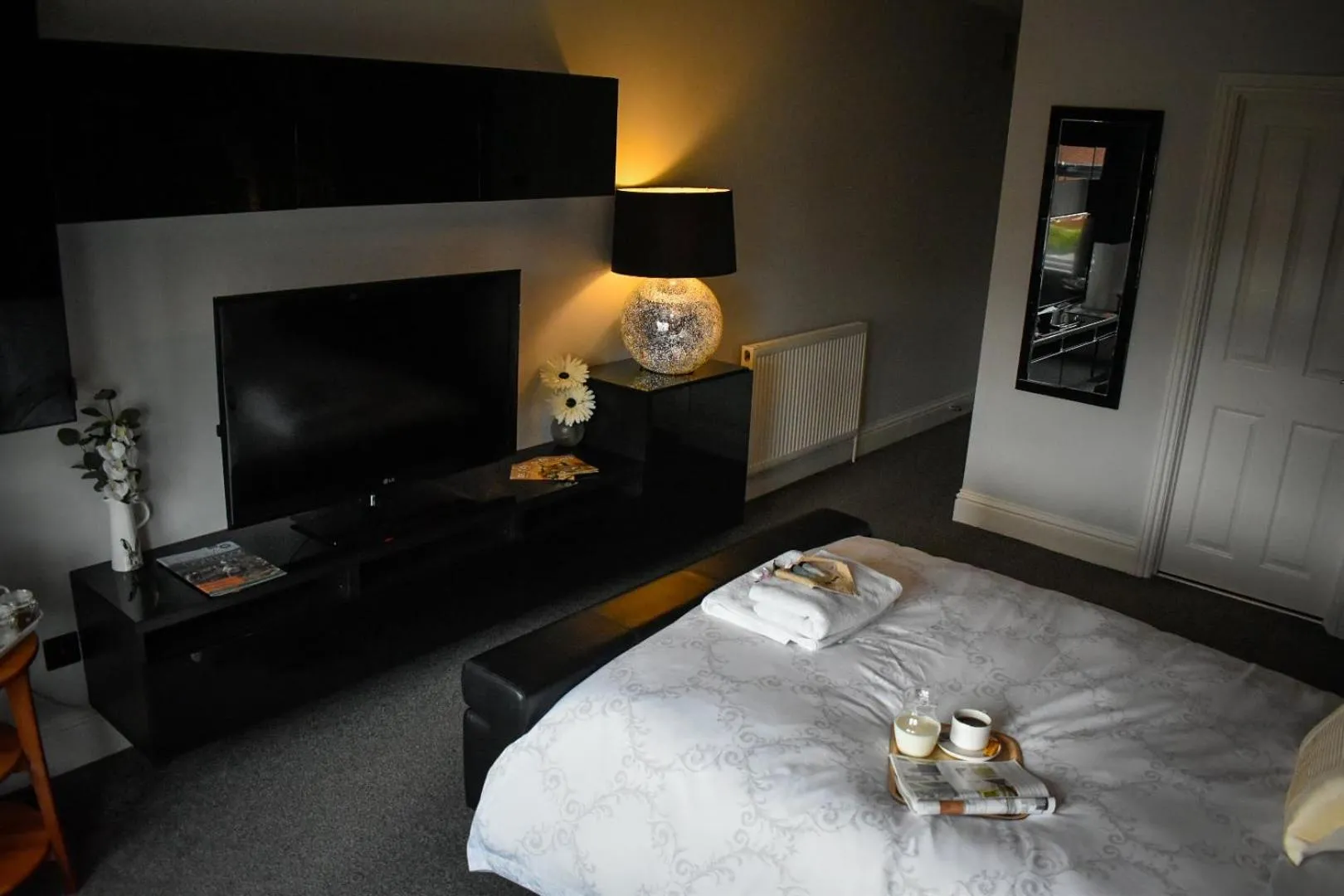Bed in TLC Exmouth Bed and Breakfast