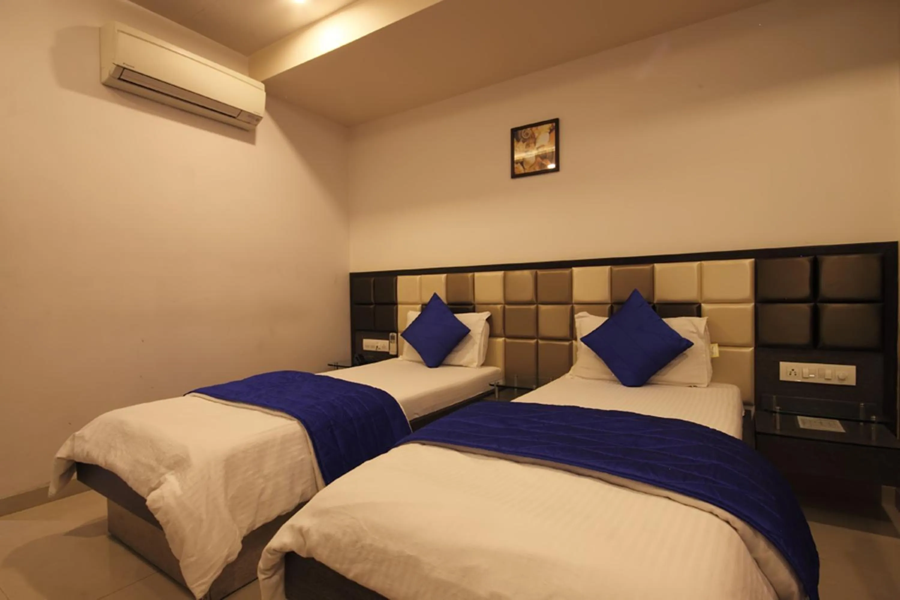 Bedroom in Hotel Flair Inn