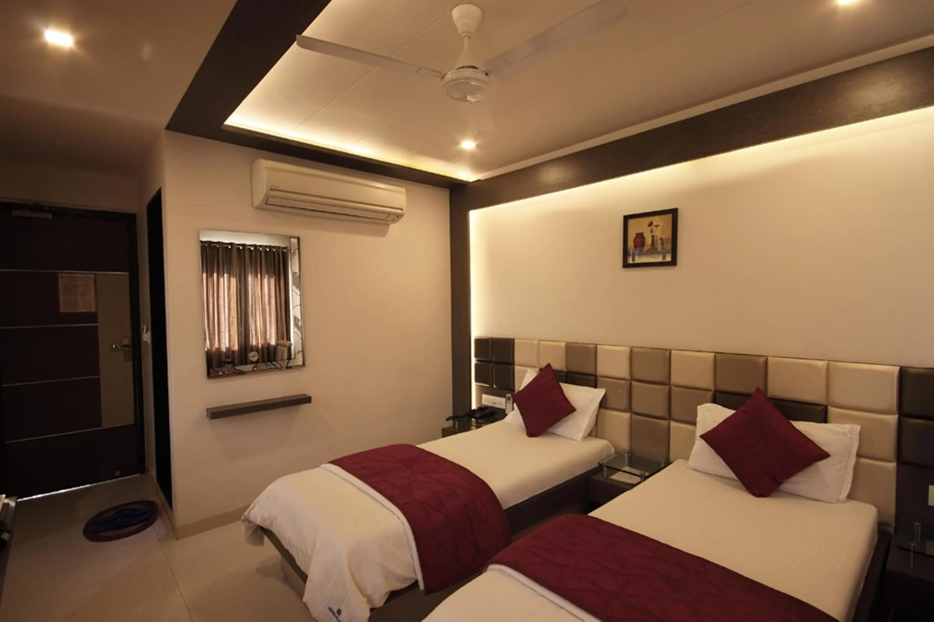 Bedroom in Hotel Flair Inn