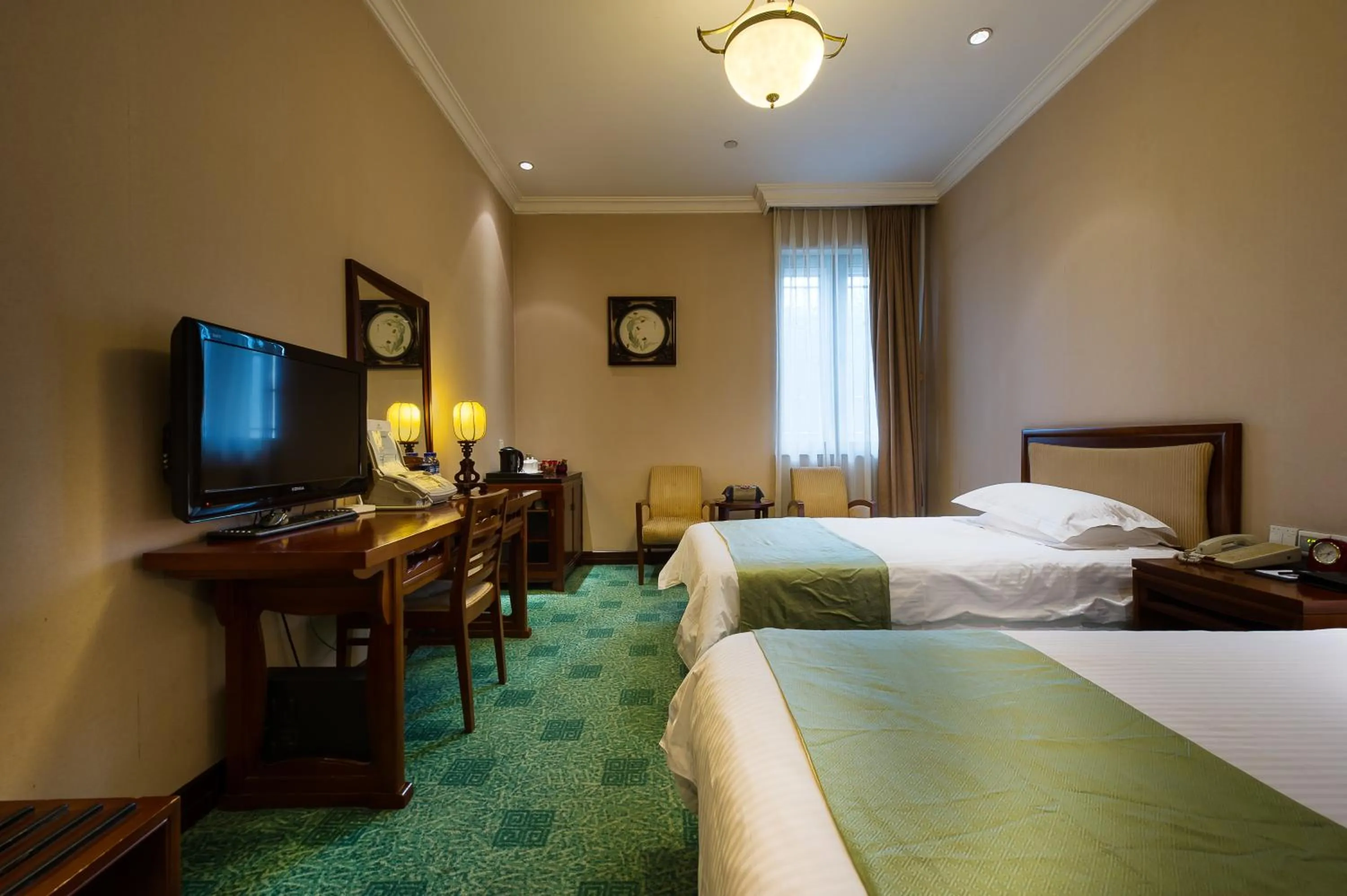 Photo of the whole room, Bed in Jade Garden Hotel