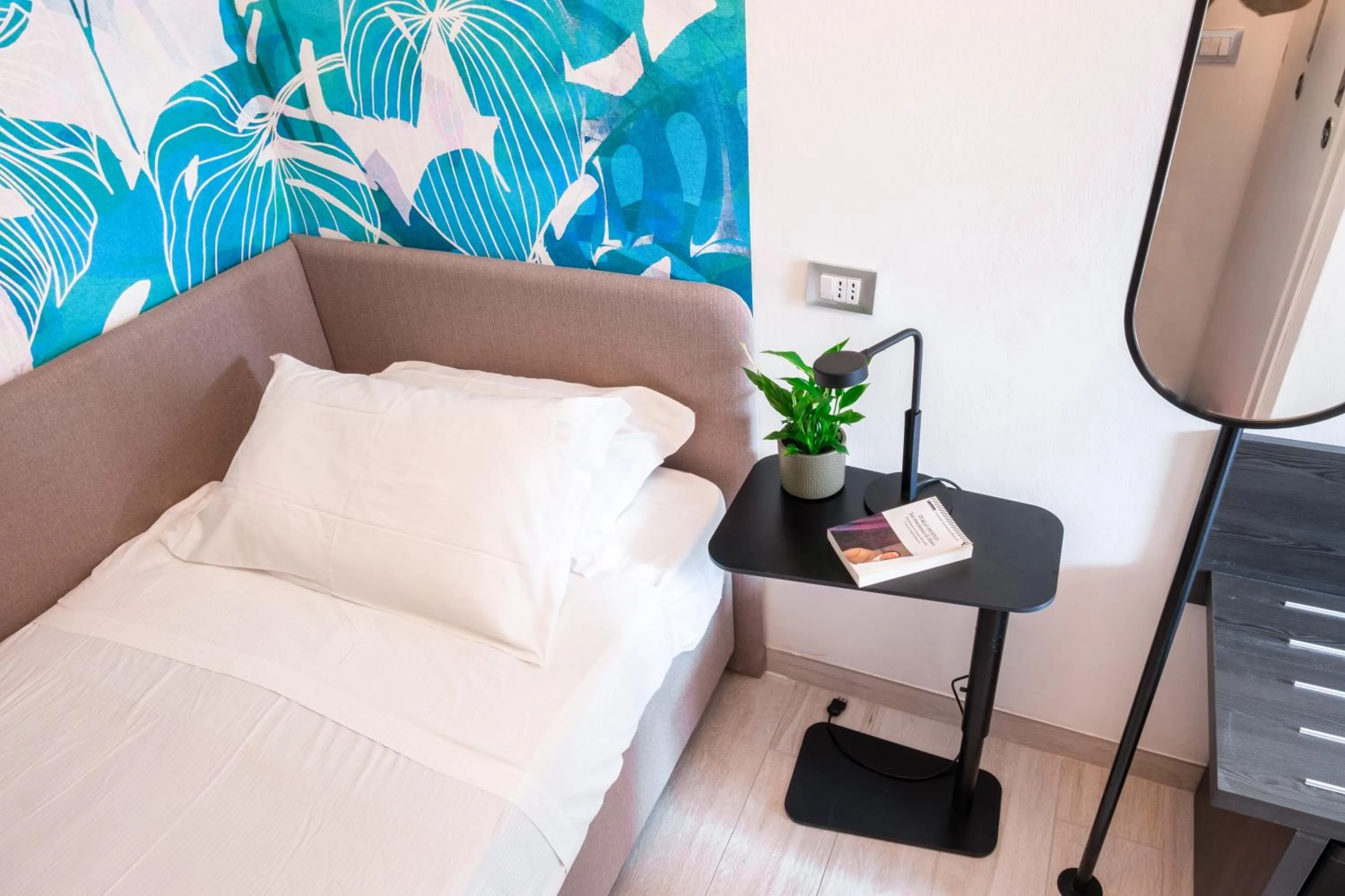 Bed in Lilium Maris Hotel