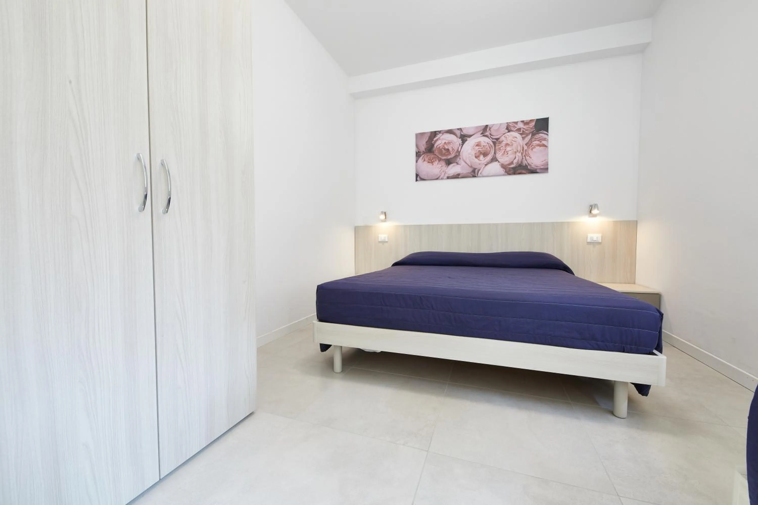 Bed in Lilium Maris Hotel